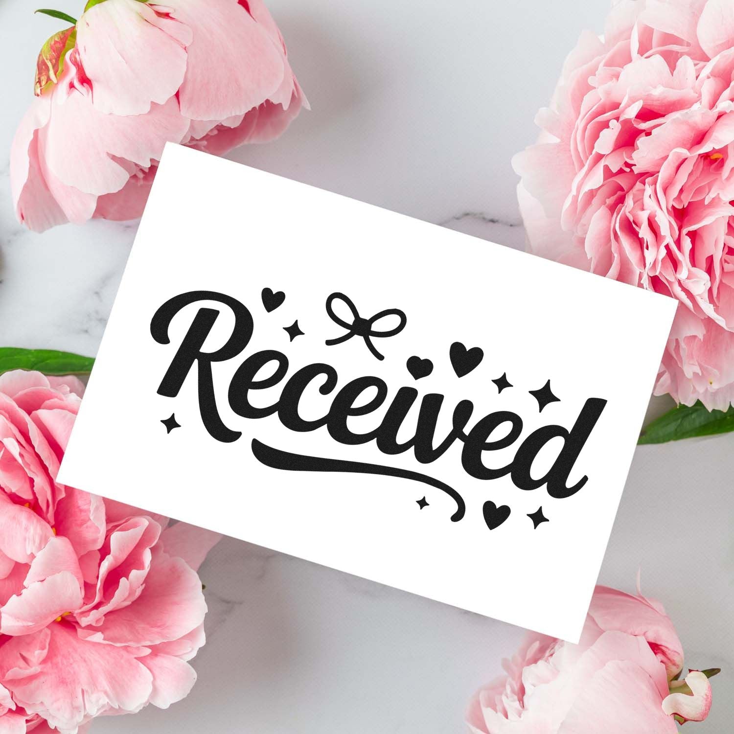 Received decorative rubber stamp design with hearts and sparkles for packaging, cards, and handmade mail.