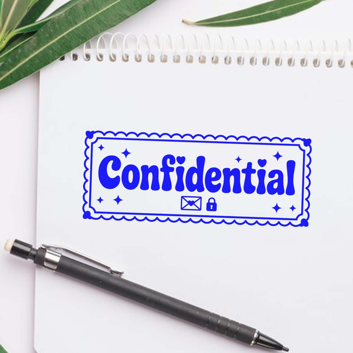 Blue Confidential rubber stamp imprint on notebook page for document security and office use