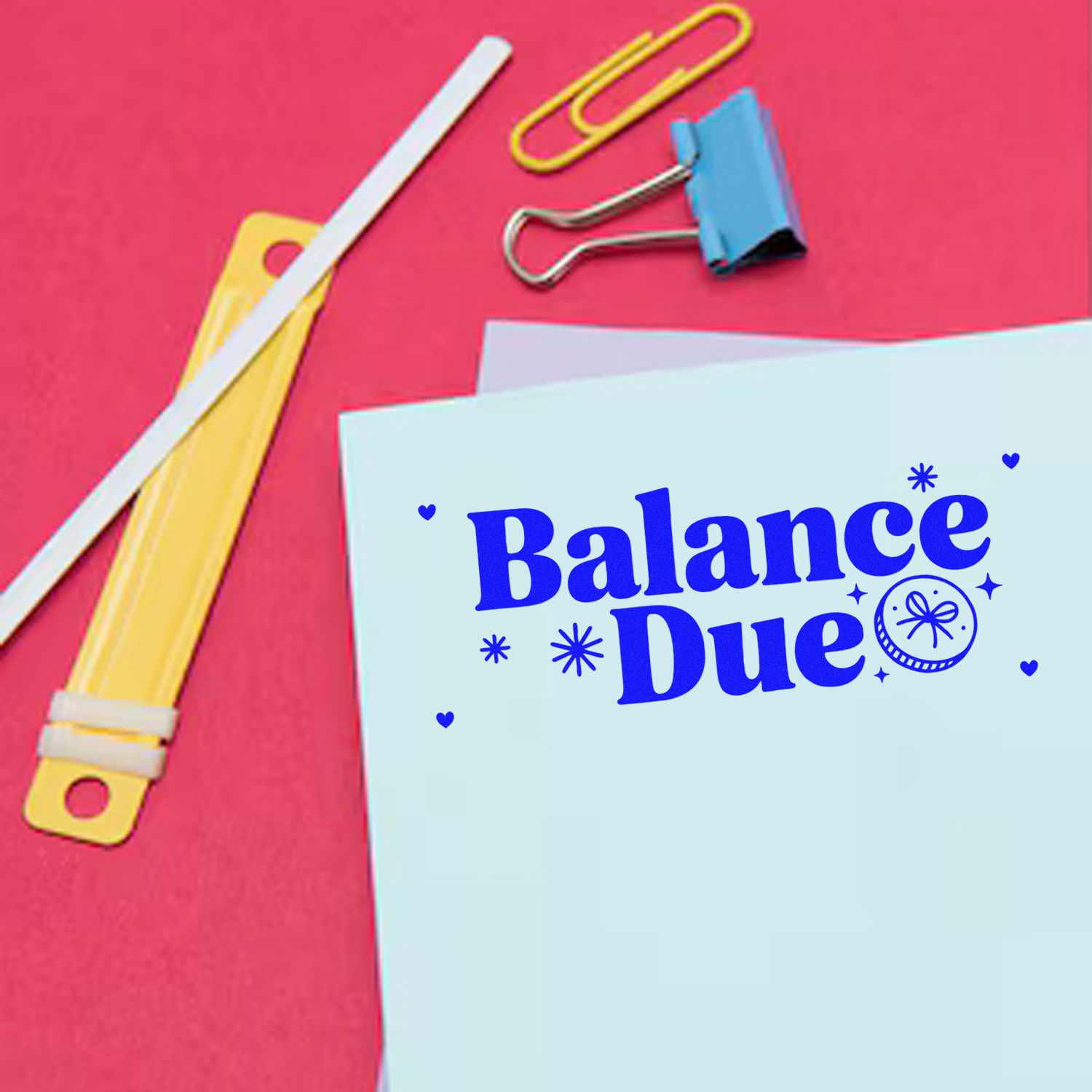 Balance Due rubber stamp style on invoice paperwork for billing, payment reminder, and office use.