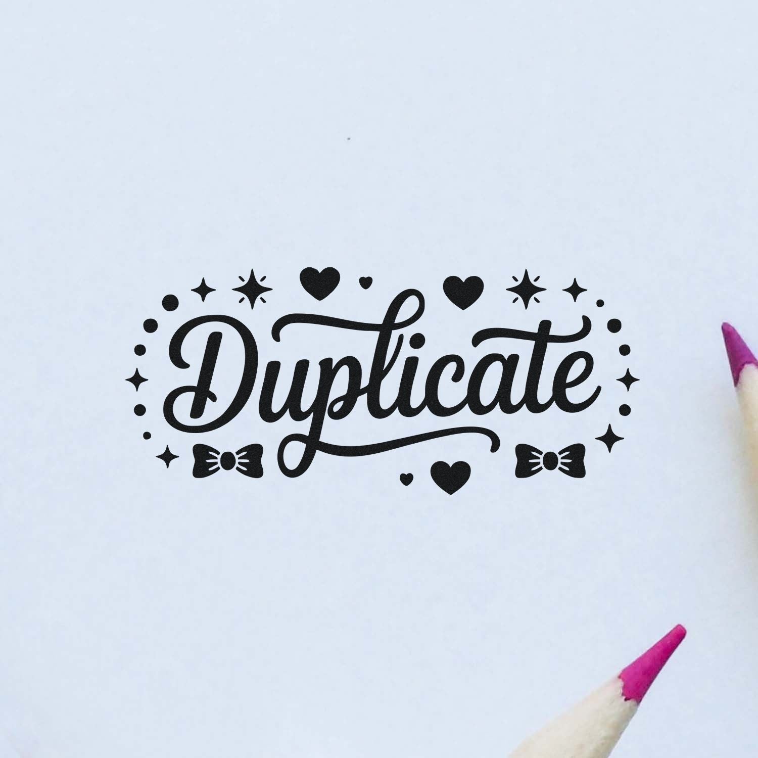 Decorative Duplicate rubber stamp design with hearts, stars, and bows for office labeling, packaging, or craft use.