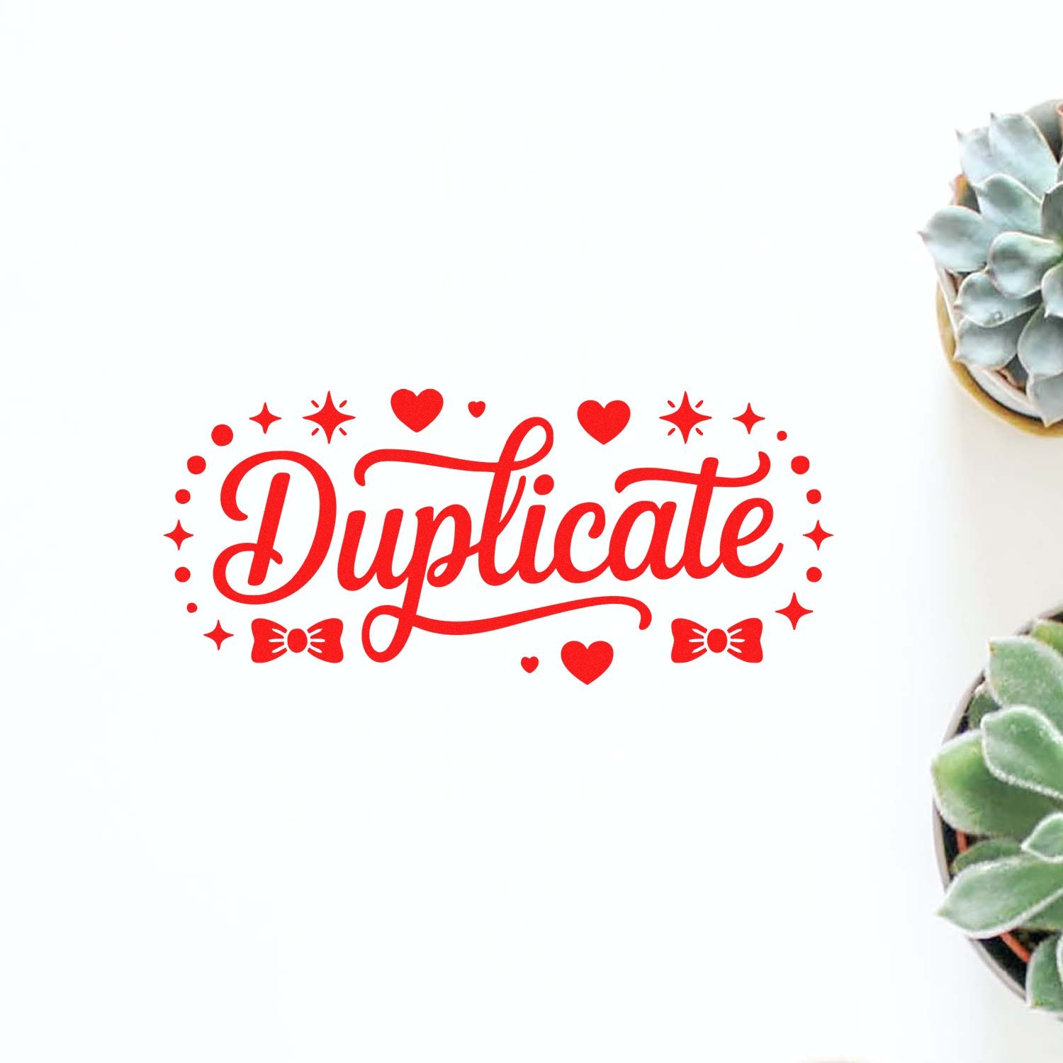 Duplicate decorative rubber stamp design with hearts, stars, and bows for office or craft use