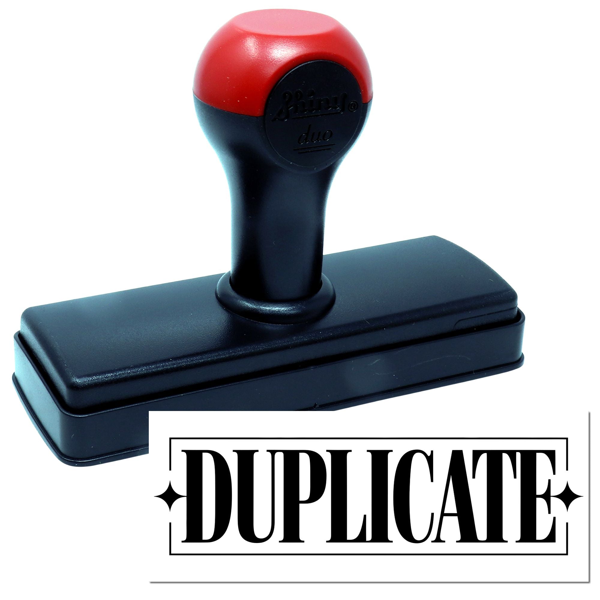 Self-inking rubber stamp marked DUPLICATE for office document control and record keeping.