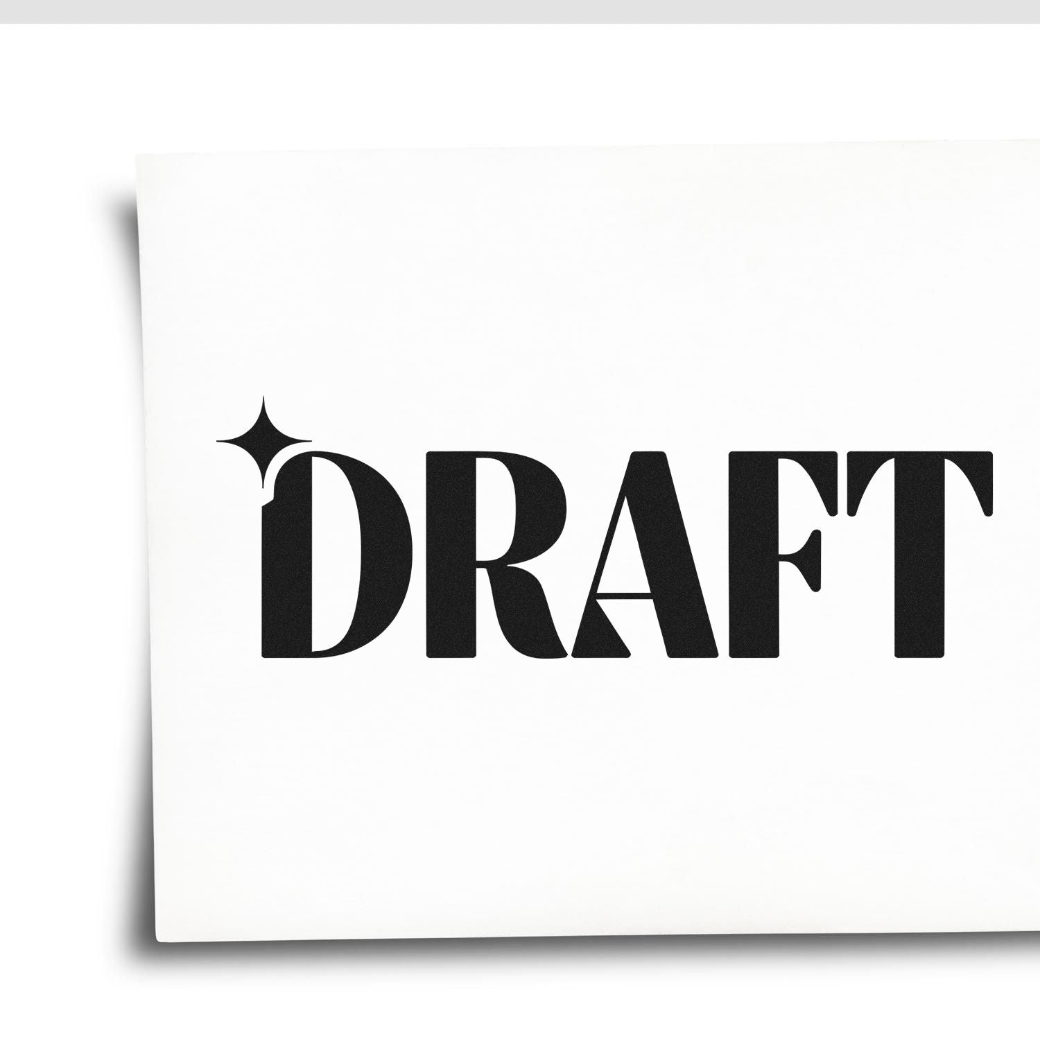 Draft rubber stamp imprint on white paper for document review, with bold black lettering and star icon.