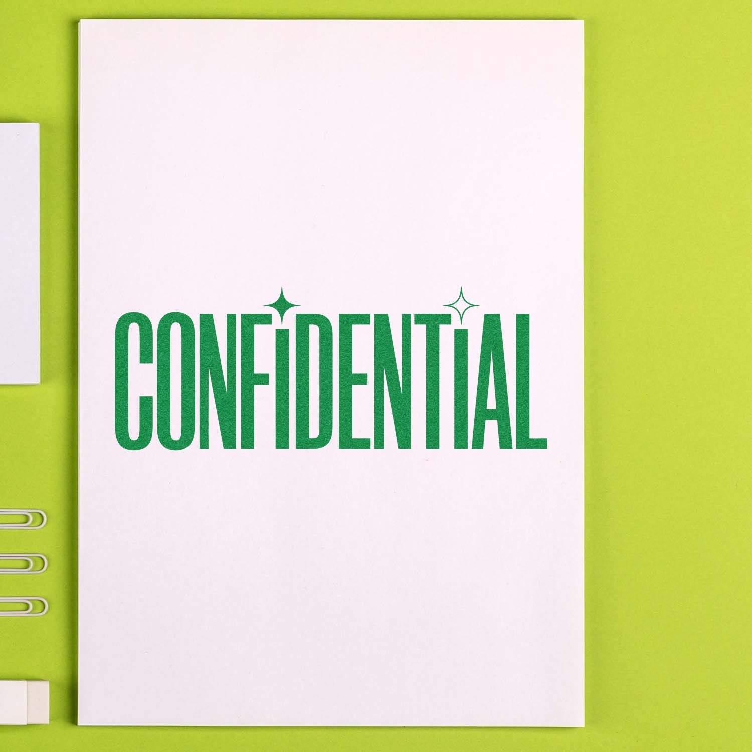 Confidential rubber stamp design on notebook cover, ideal for office document marking and secure file labeling.
