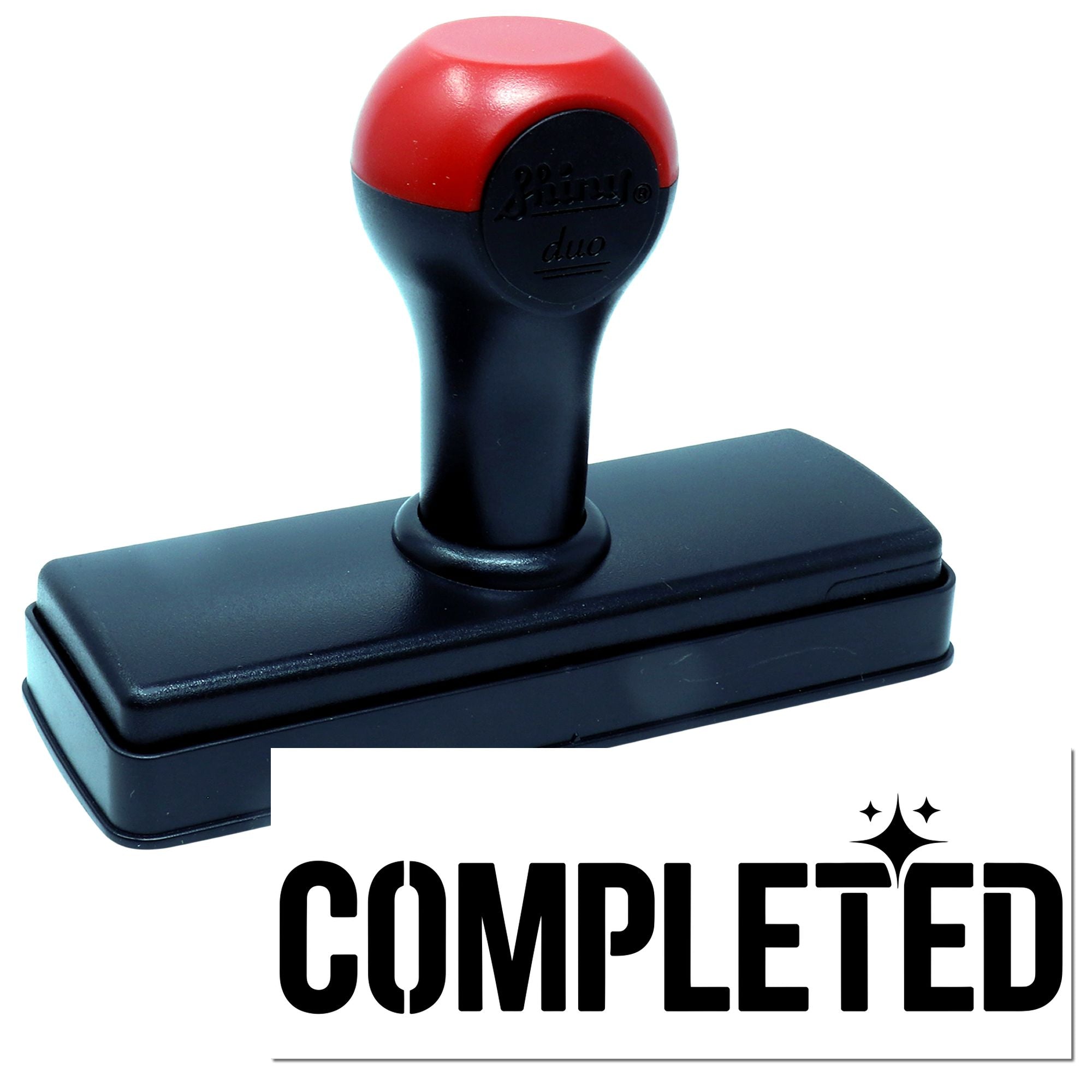 Self-inking rubber stamp with Completed impression for office approval and document marking.