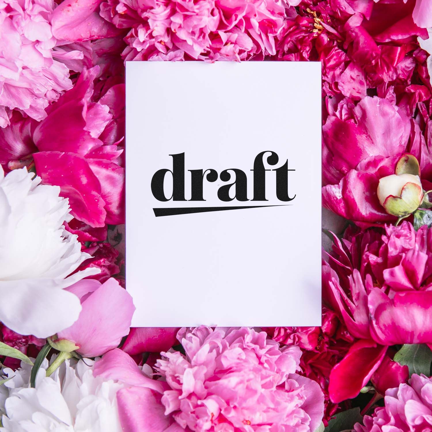 Draft rubber stamp design on white card with pink flowers, perfect for document approval and office use.