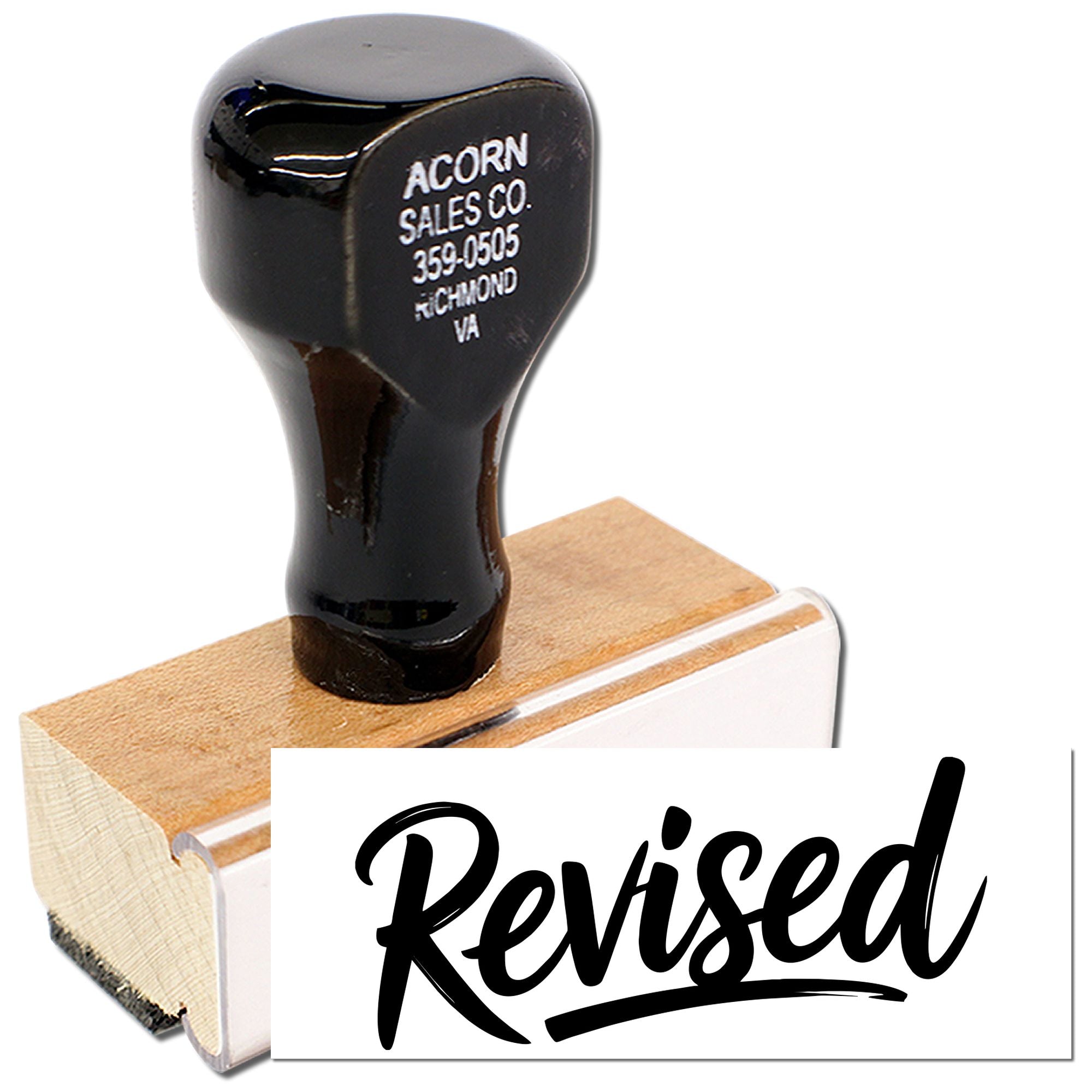 Wood-handled rubber stamp with Revised imprint for marking documents, office files, and forms.
