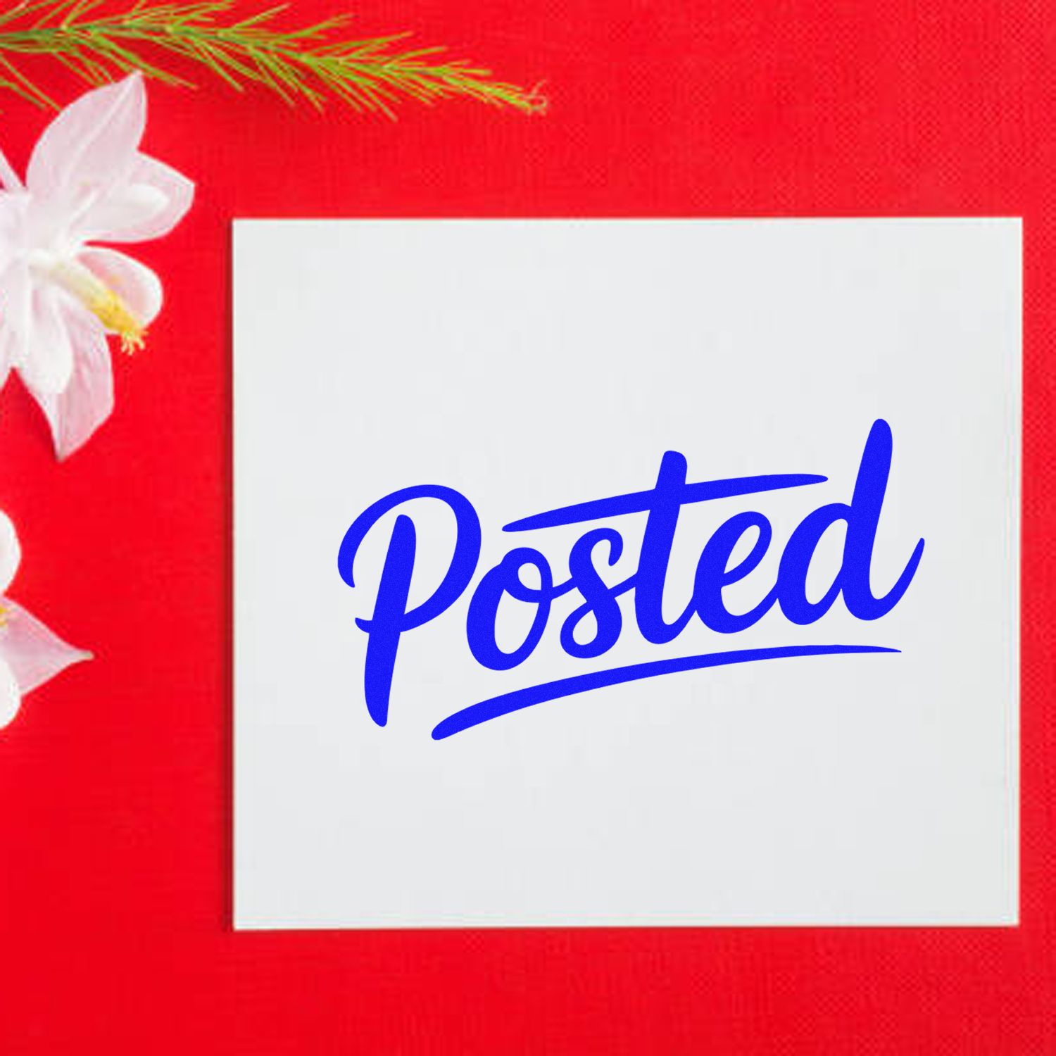 Blue Posted rubber stamp for mail or office use on white card with red floral background.