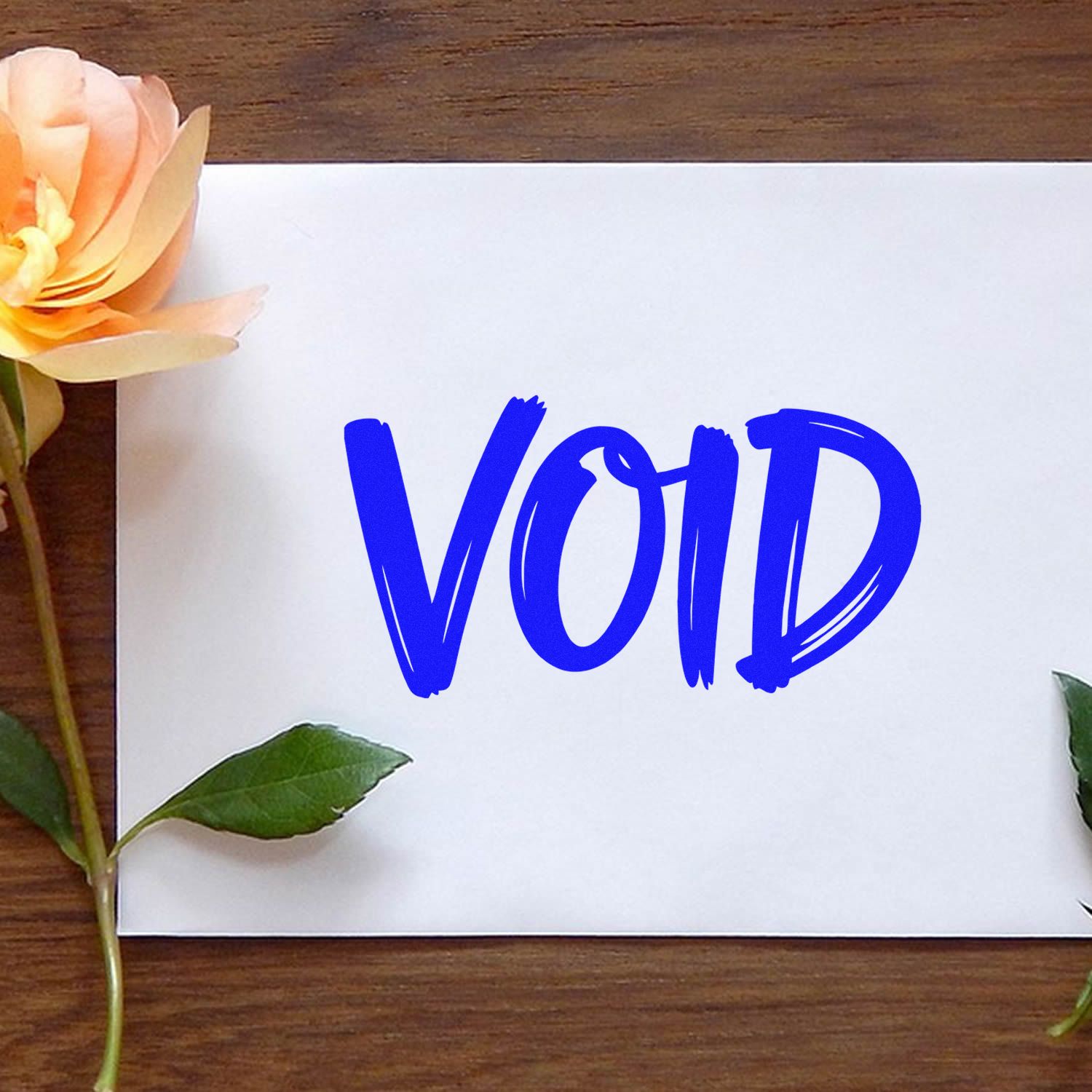 Blue VOID rubber stamp impression for document marking and office use