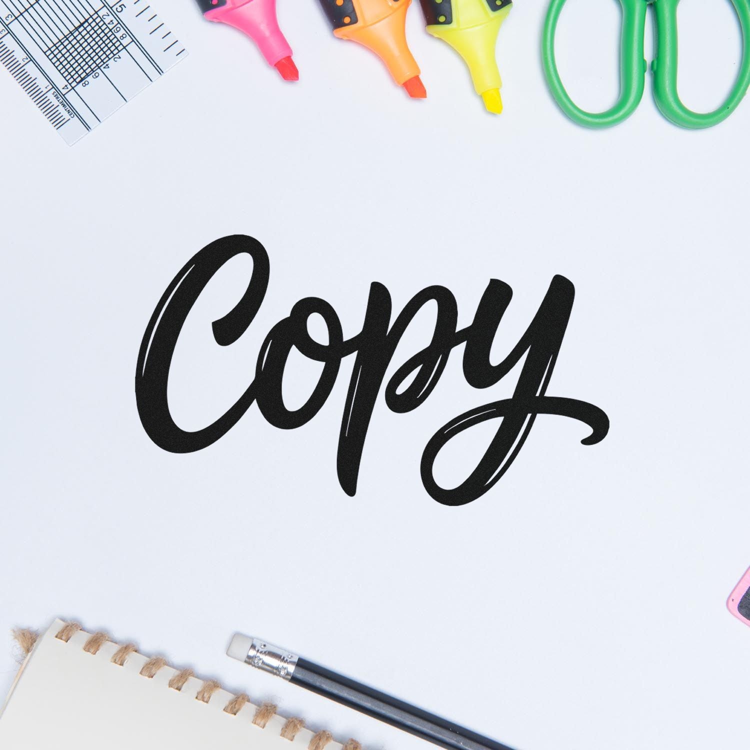 Copy rubber stamp design on white background with colorful craft tools, ideal for office, stationery, and custom stamp use.