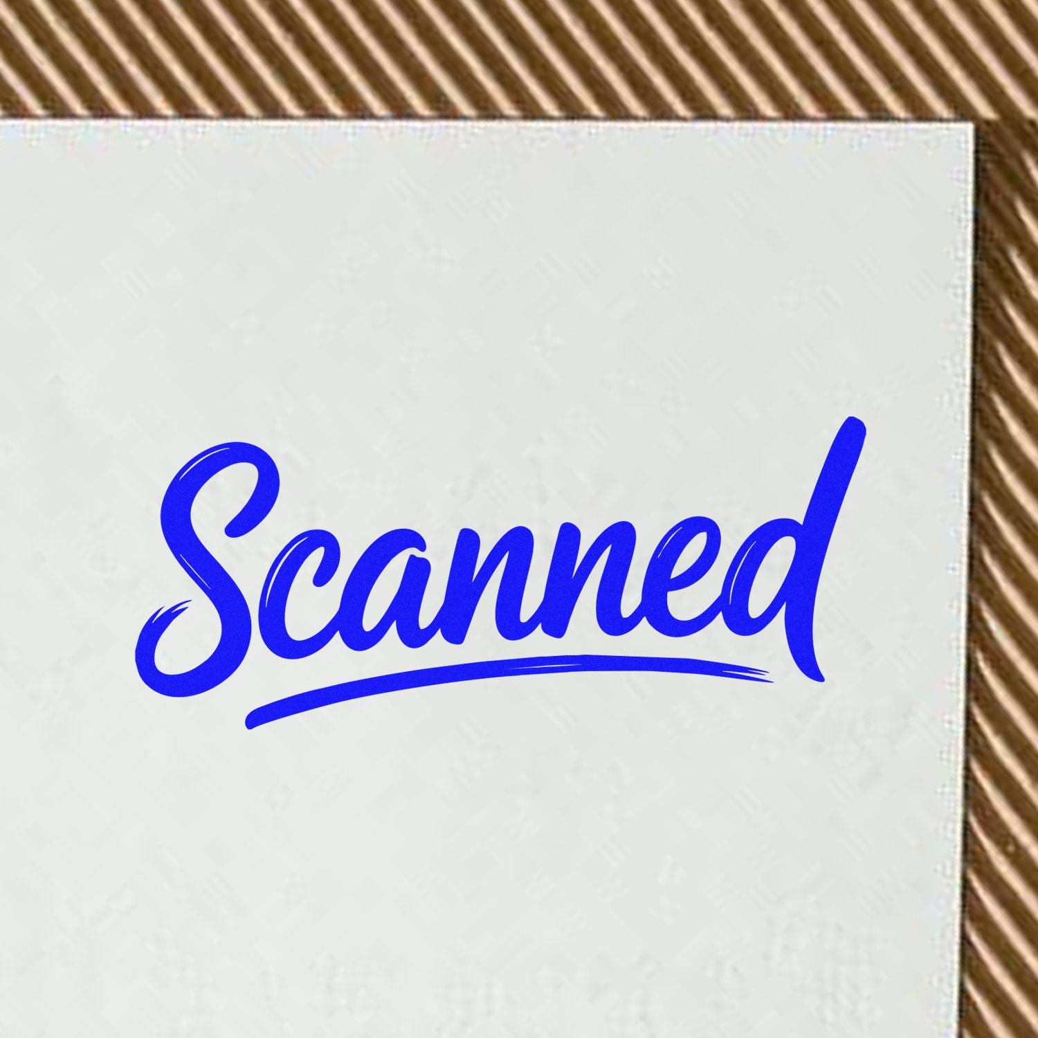 Blue Scanned rubber stamp imprint on paper for document processing and office file organization.
