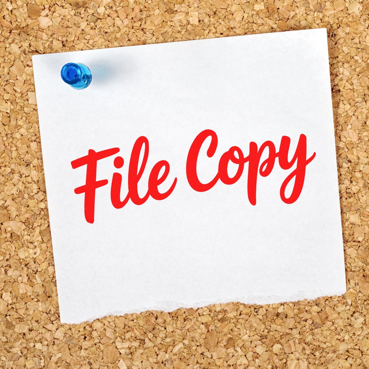 Red File Copy rubber stamp on pinned note for office document filing and record labeling.