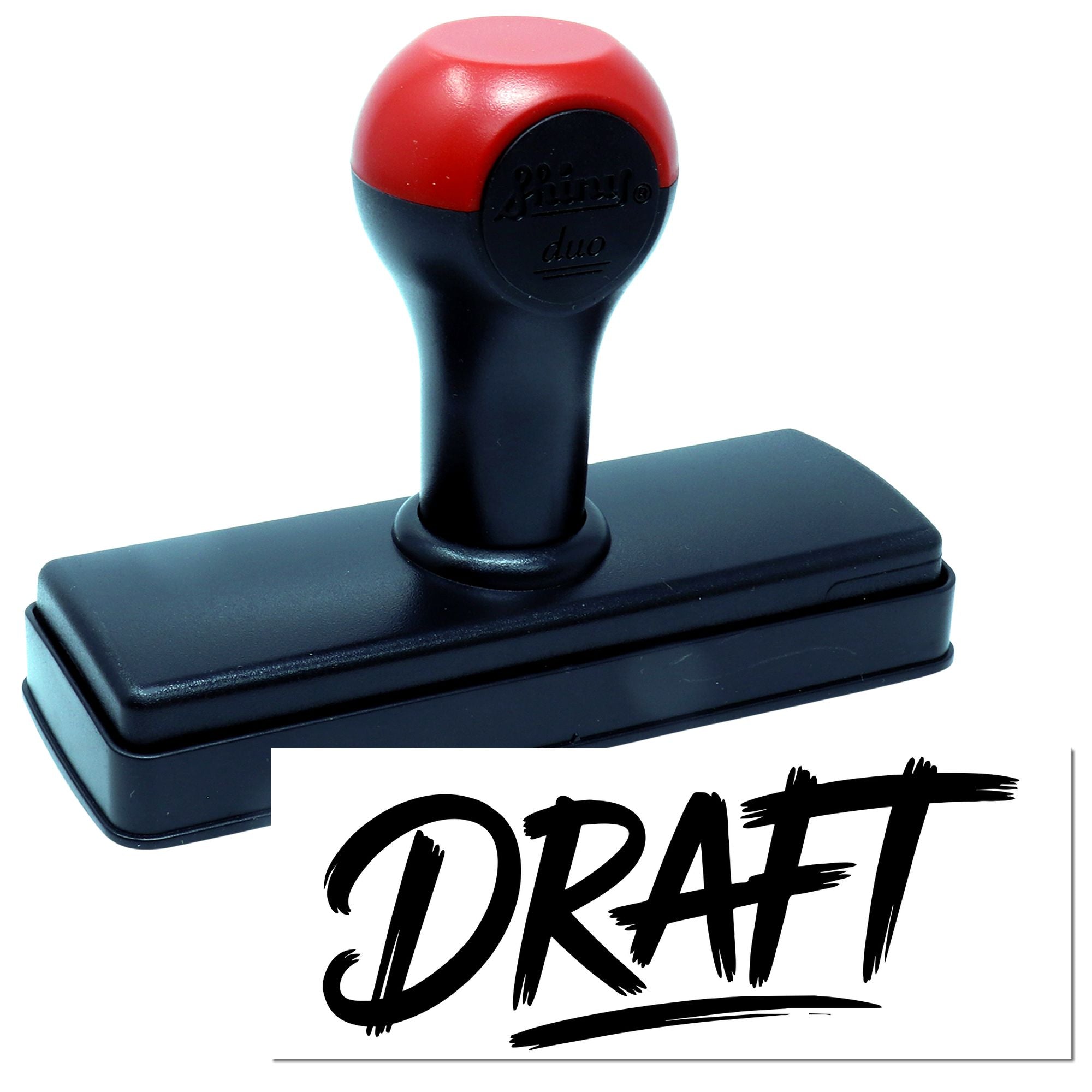 Self-inking rubber stamp with red handle and DRAFT imprint for marking documents as draft.