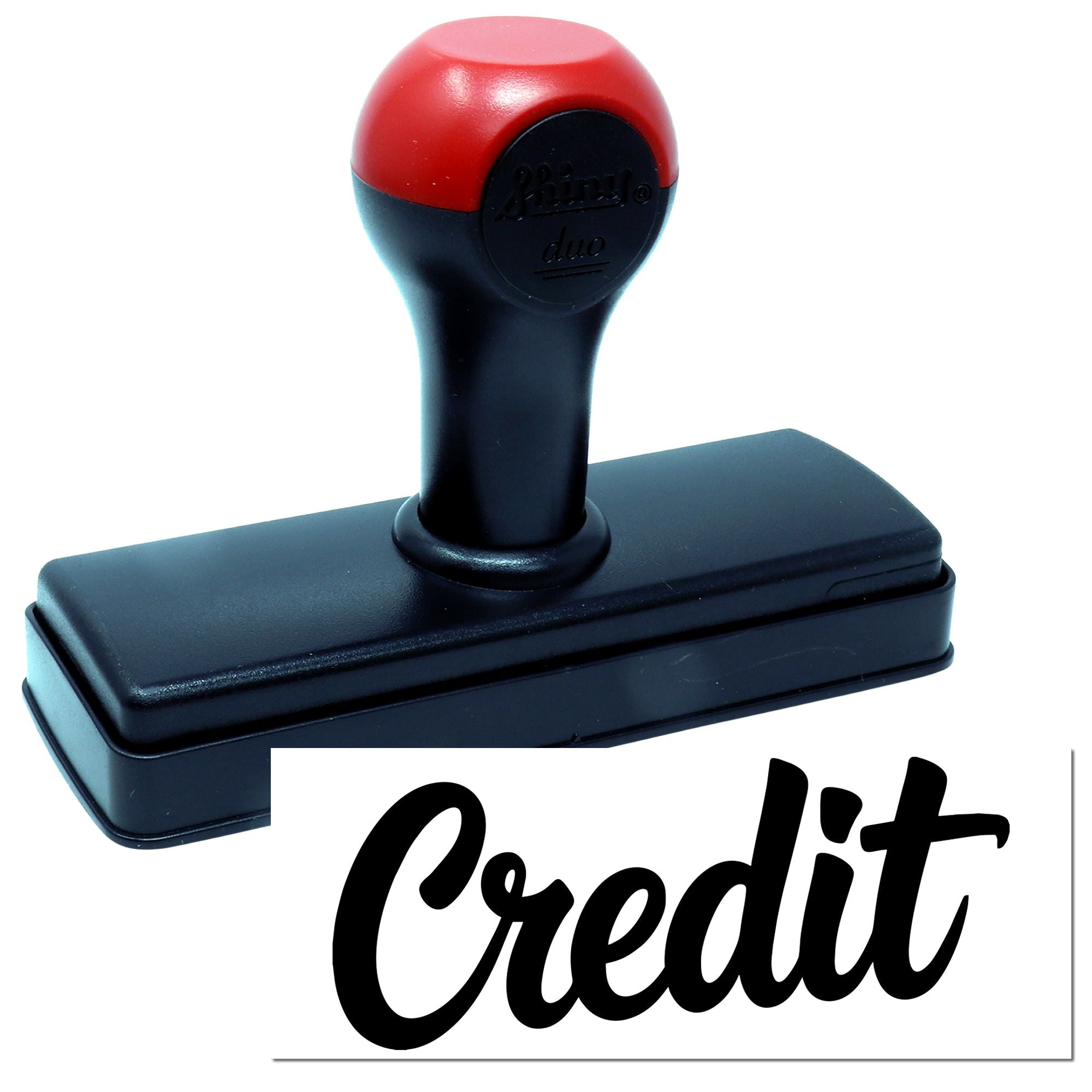 Self-inking rubber stamp with Credit imprint for office paperwork, accounting, and document approval.