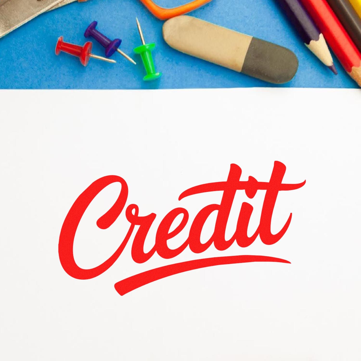 Red Credit rubber stamp design on paper, ideal for accounting, finance, and office labeling.