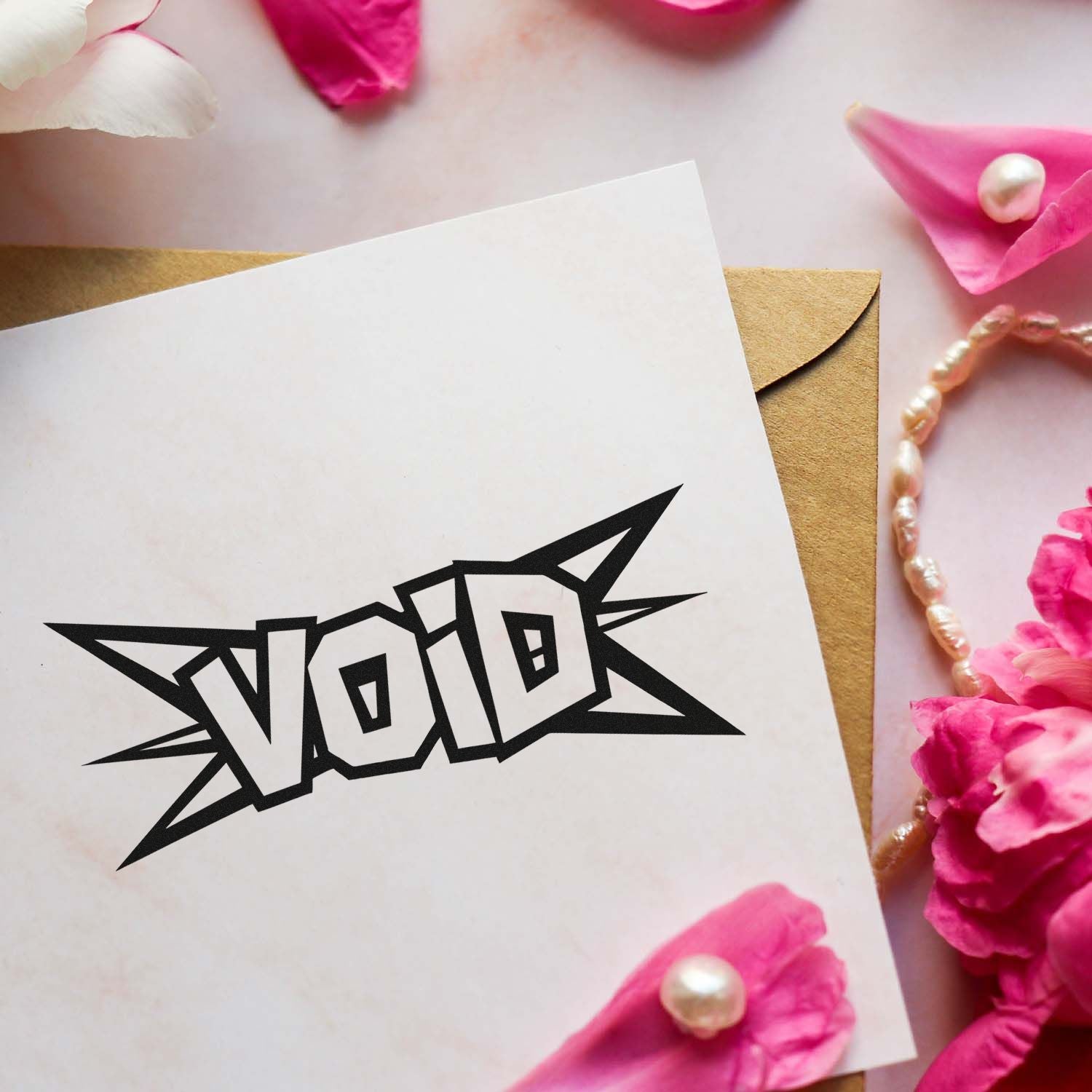 Bold VOID rubber stamp on a white card and envelope, ideal for document cancellation and security marking.