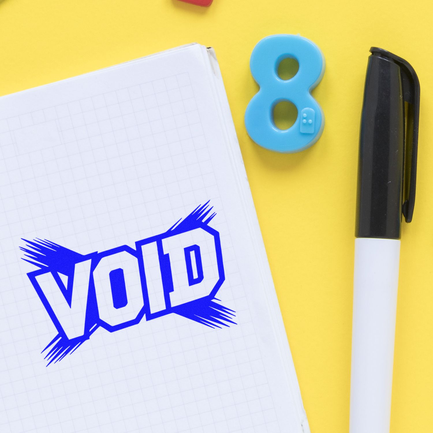 VoIP rubber stamp impression on notebook with marker and number 8 stamp on a yellow background