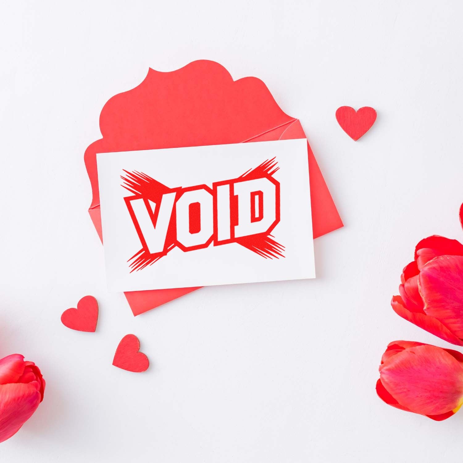 Red VOID rubber stamp design on white card with hearts and petals, ideal for Valentine-themed stationery.