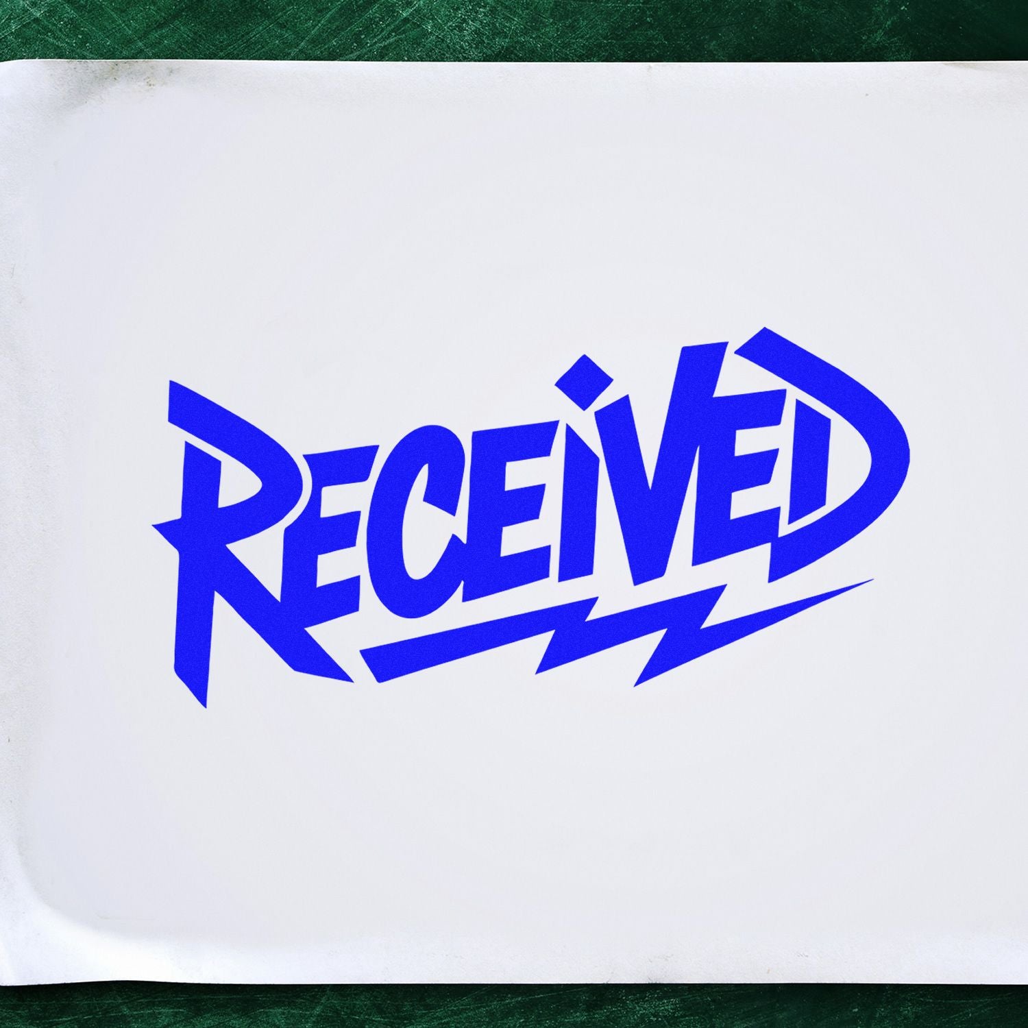 Blue RECEIVED rubber stamp imprint on paper for document processing, approval, and office record keeping.