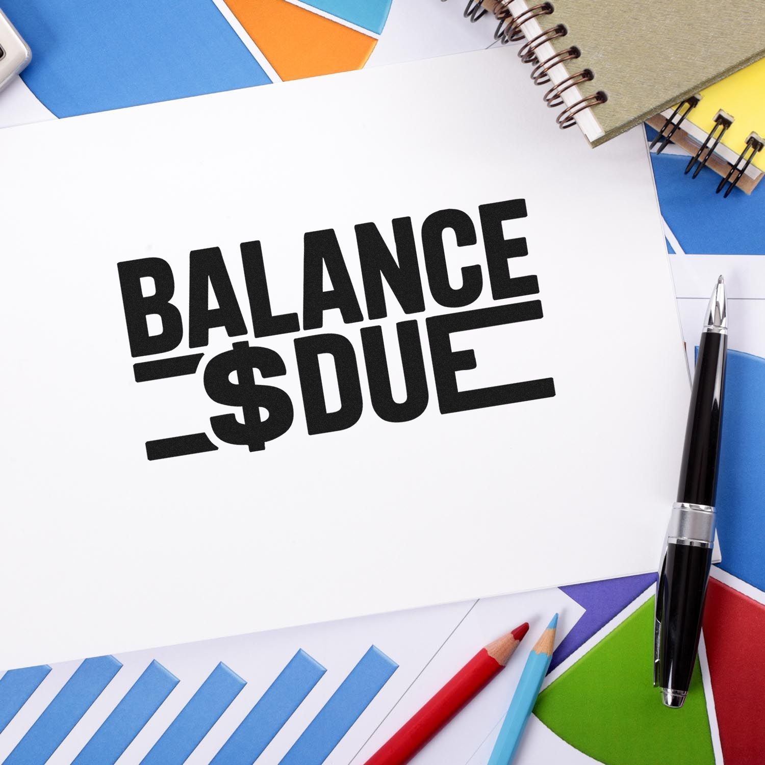 Balance Due rubber stamp on invoice paperwork, ideal for office accounting and payment reminder use.