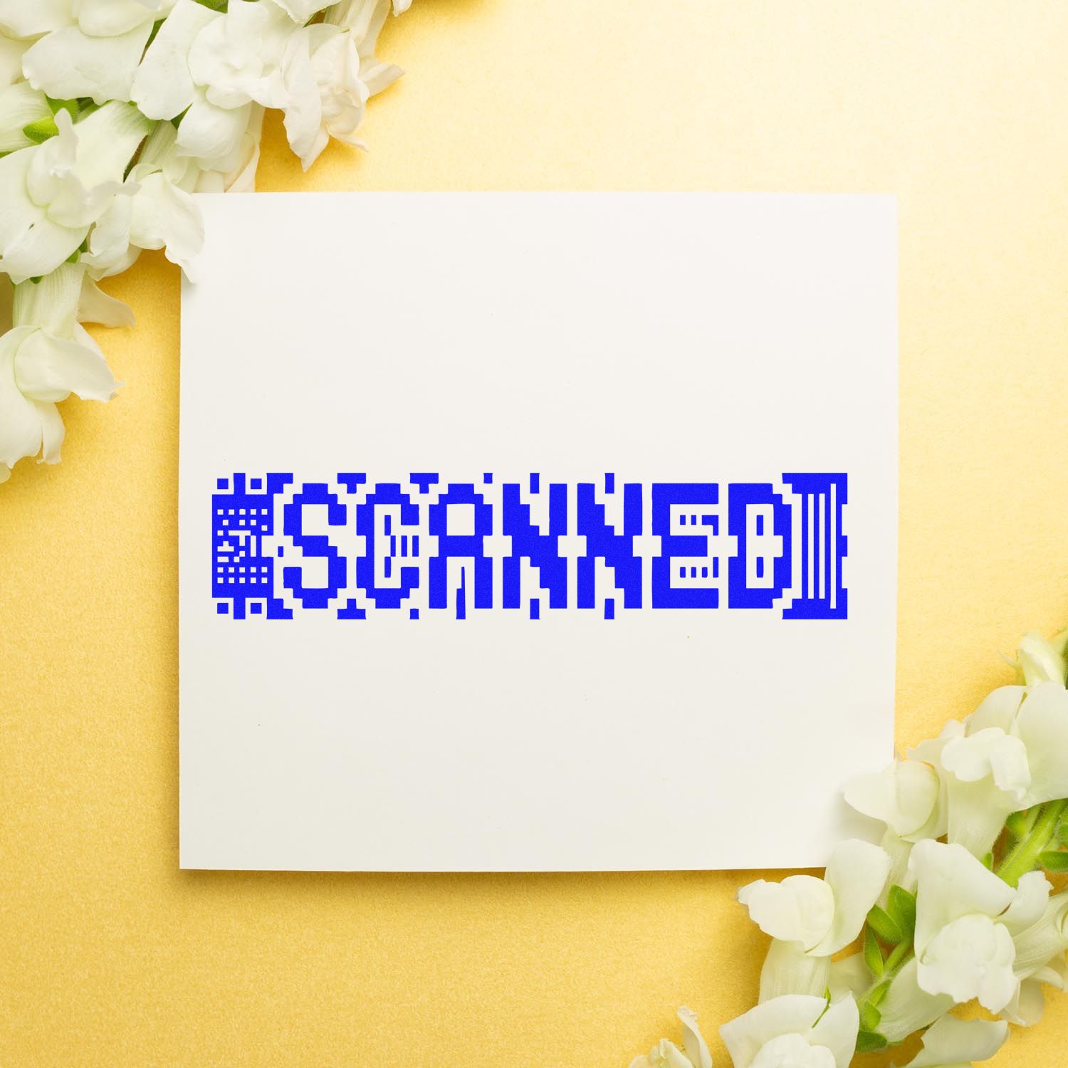 Custom blue Scanned rubber stamp design on white card with floral accents.