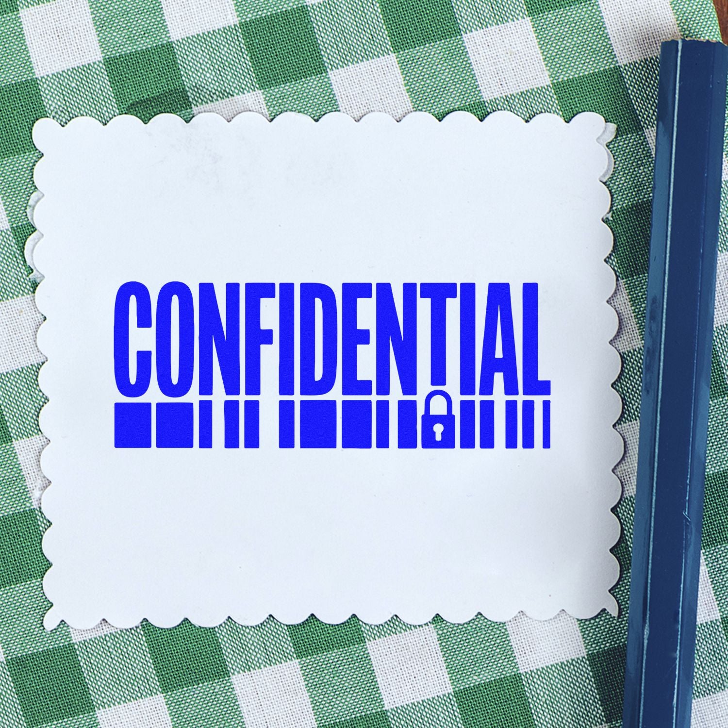 Confidential rubber stamp with lock icon on scalloped card, ideal for office document security and privacy labeling.