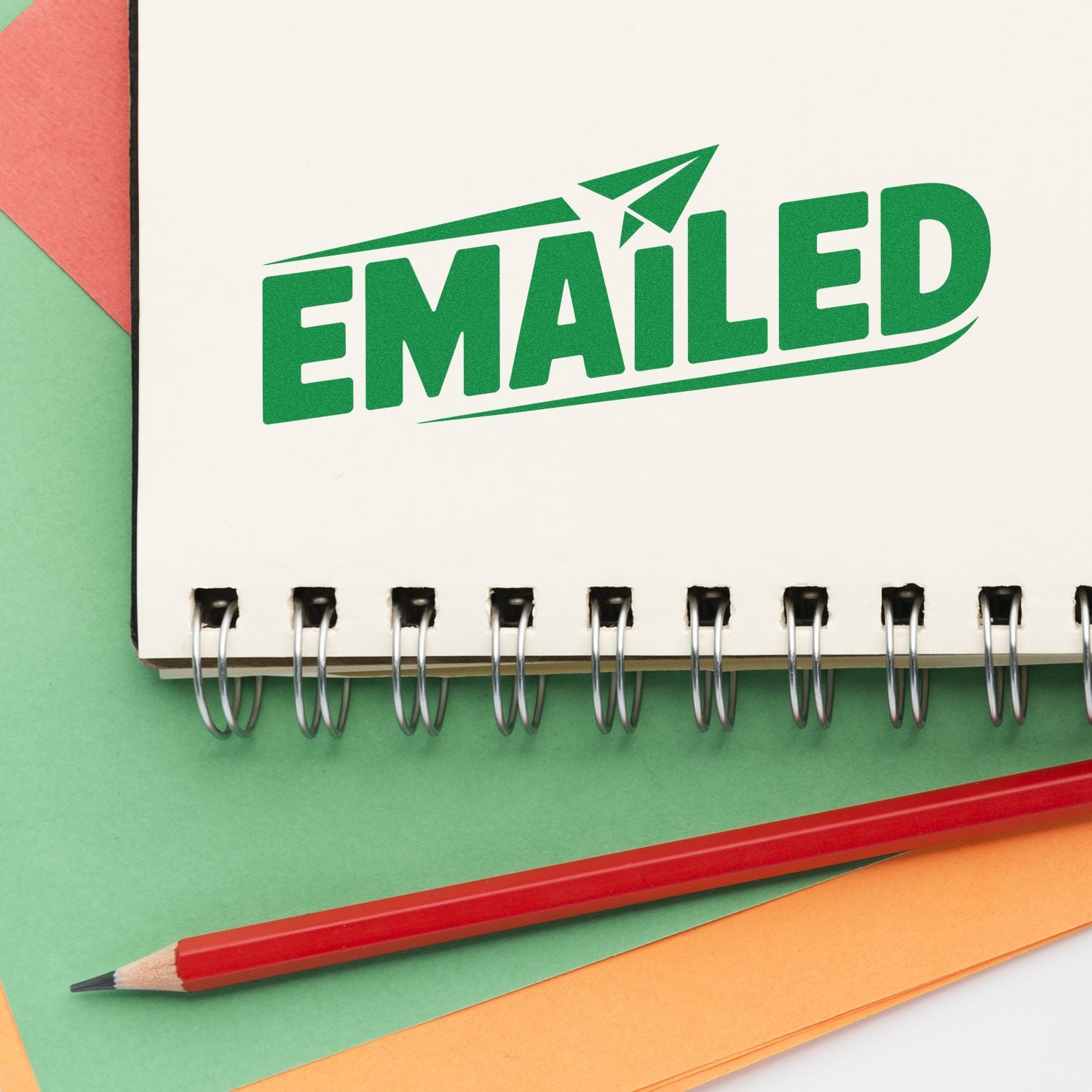 Emailed rubber stamp on notebook, perfect for office mail tracking and custom business stamp branding.