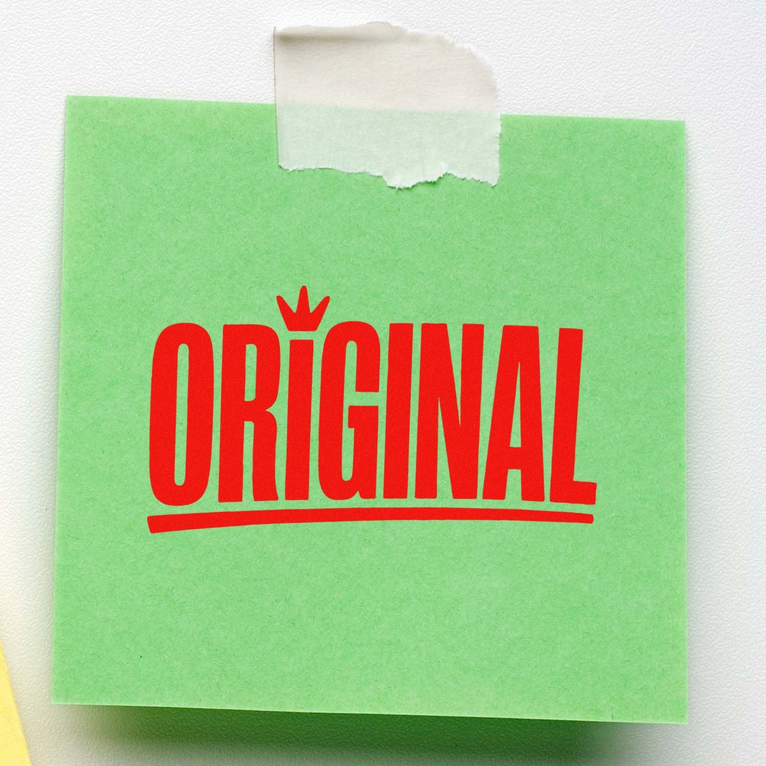 Original rubber stamp impression on green paper note, used to mark authentic custom branding or handmade packaging.