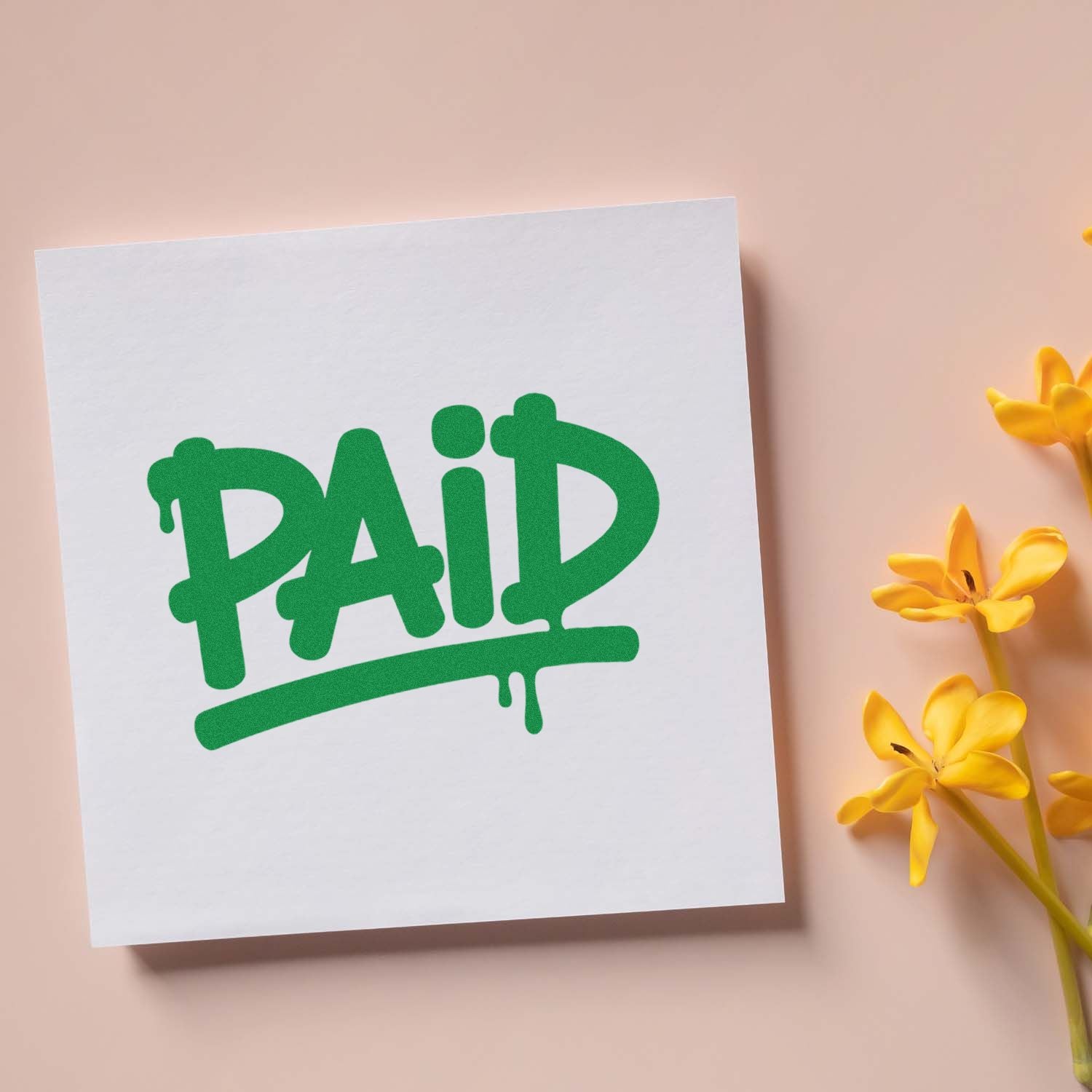 Green PAID rubber stamp on white paper, ideal for business invoicing, accounting approval, and office organization.