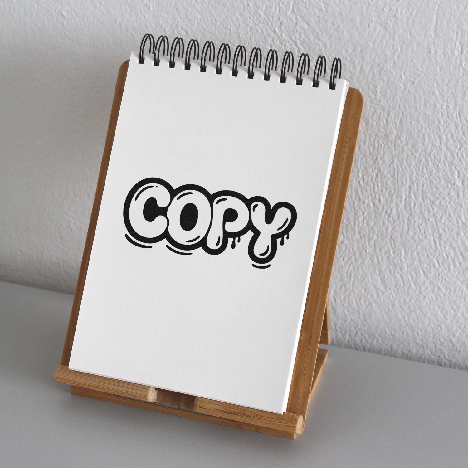 Copy rubber stamp mockup on notepad, ideal for document labeling, office use, and stationery branding.