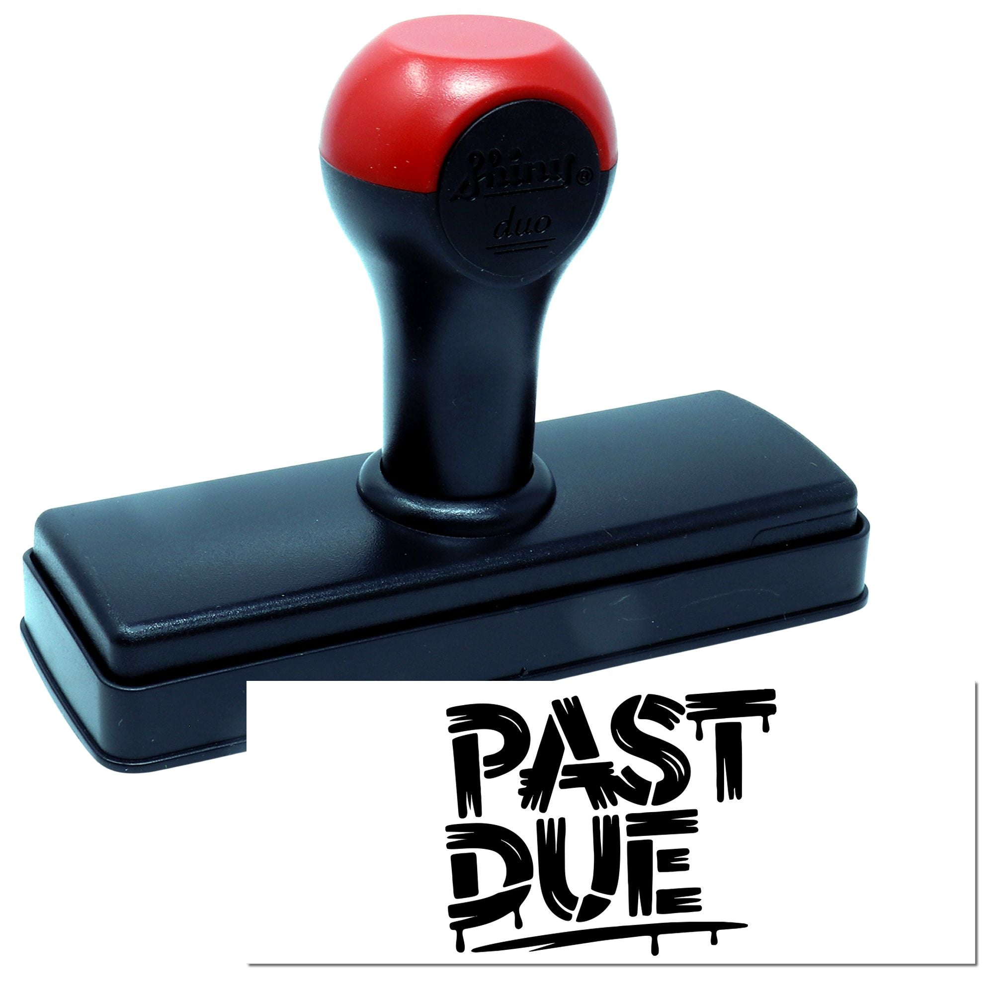 Self-inking rubber stamp with PAST DUE imprint for office paperwork and invoice reminder marking.
