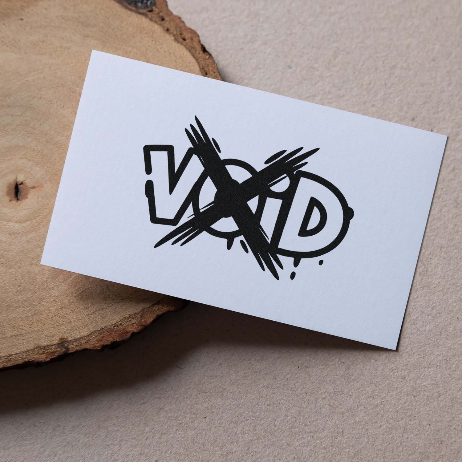 VOID rubber stamp impression on white card for document cancellation and approval control