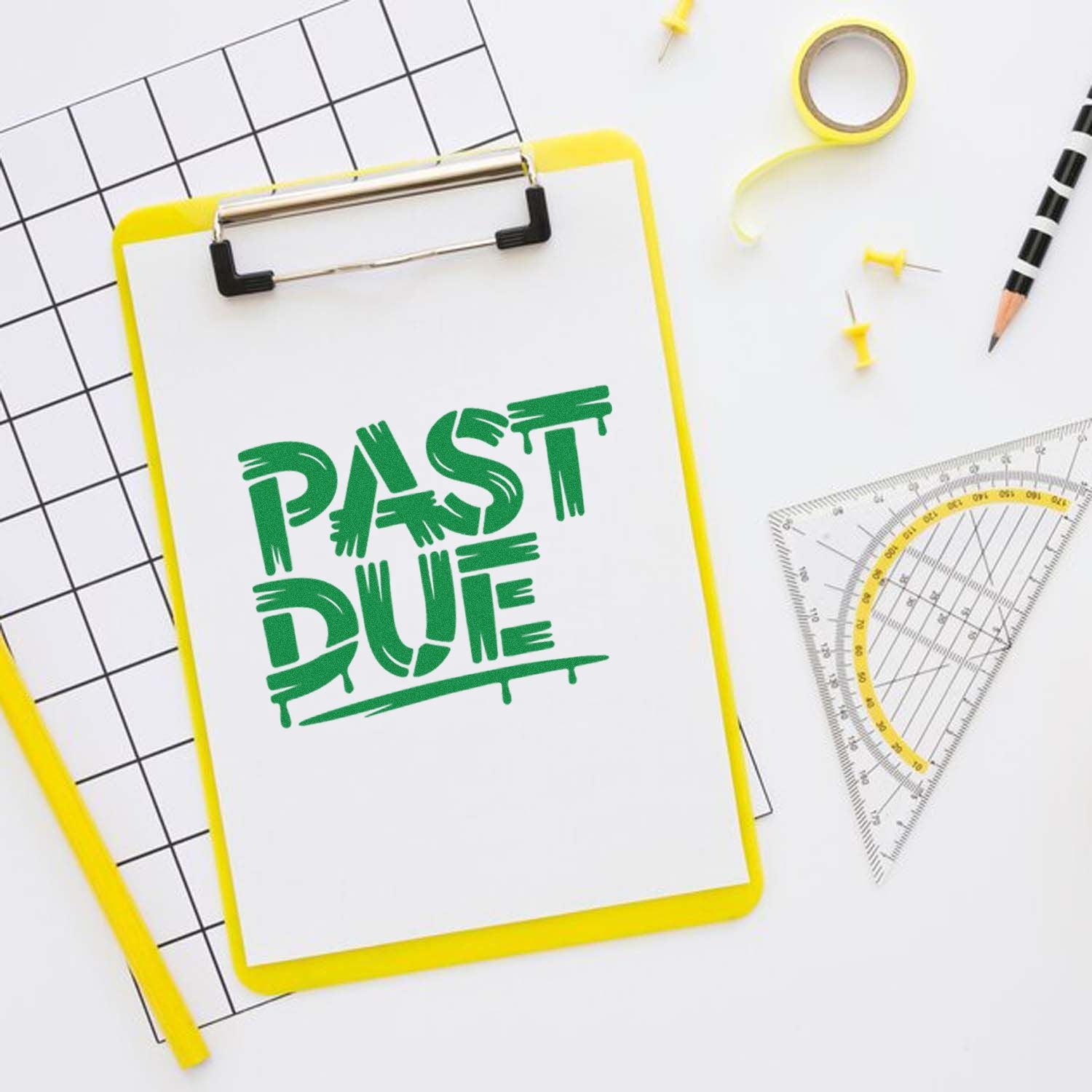 Past Due rubber stamp on clipboard with office supplies, for invoice and billing reminders.