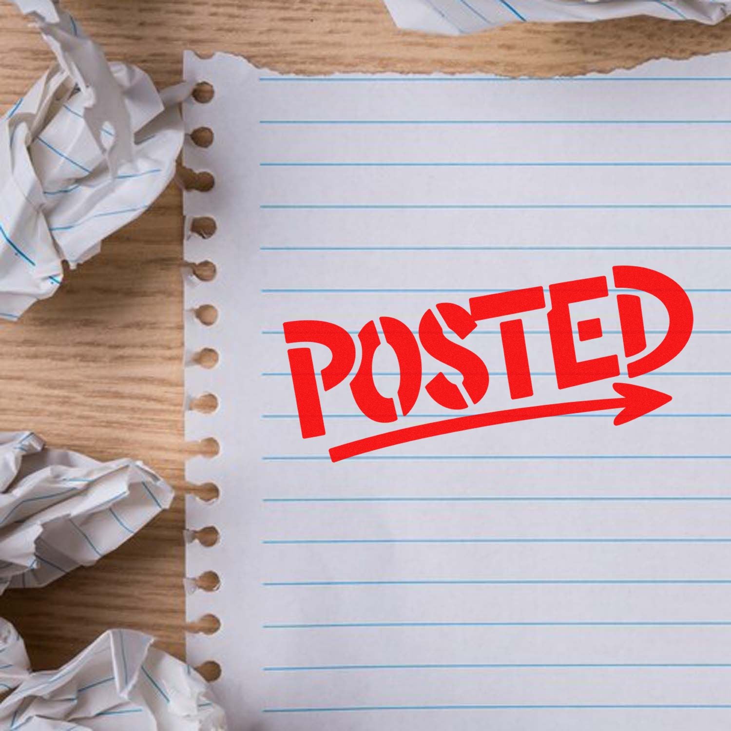 Red POSTED rubber stamp imprint on lined paper for office mail and document marking.