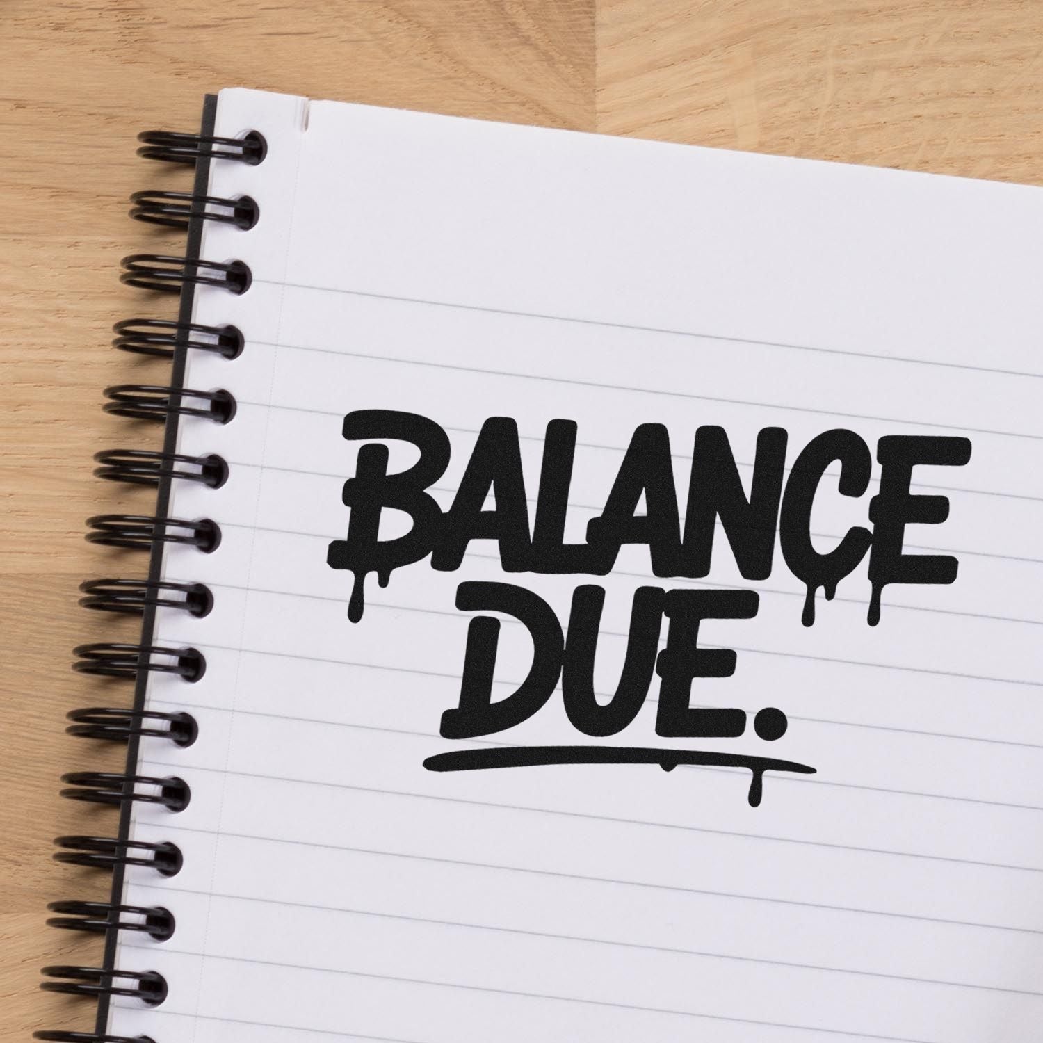 Balance Due rubber stamp text on notebook paper, ideal for invoice, billing, and payment reminder stamps.