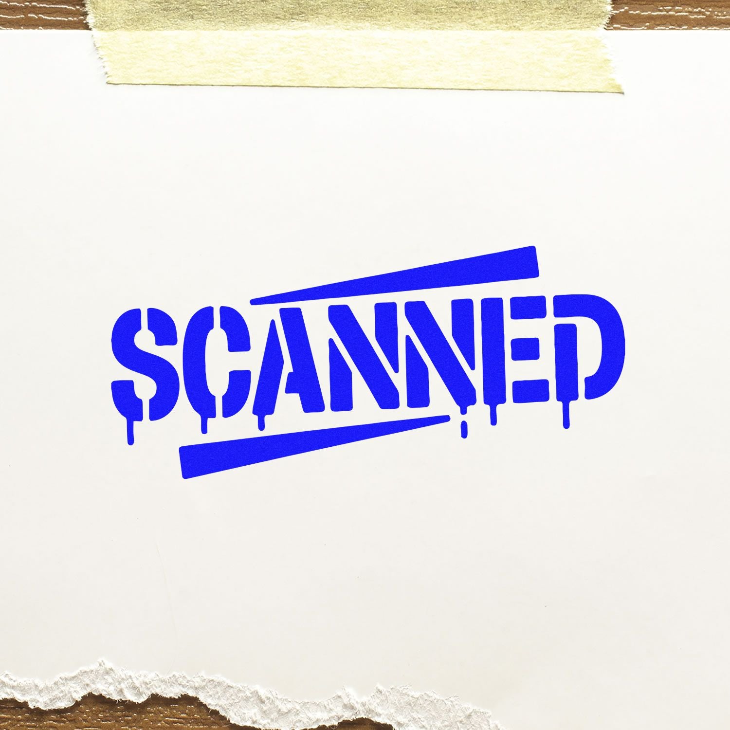 Blue SCANNED rubber stamp on paper, marking a document as scanned.