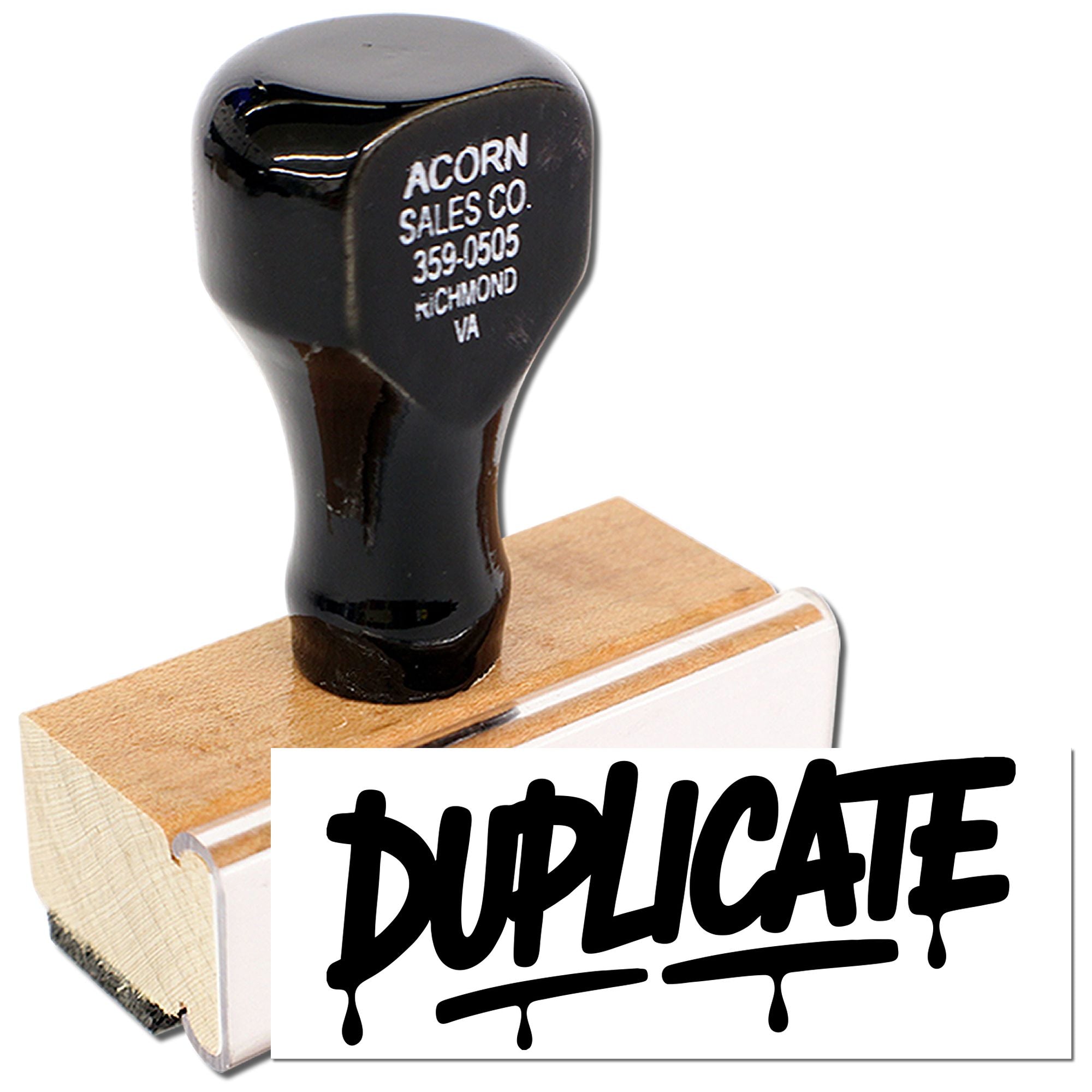 Duplicate rubber stamp with wooden handle for marking copies and duplicate documents in office use.