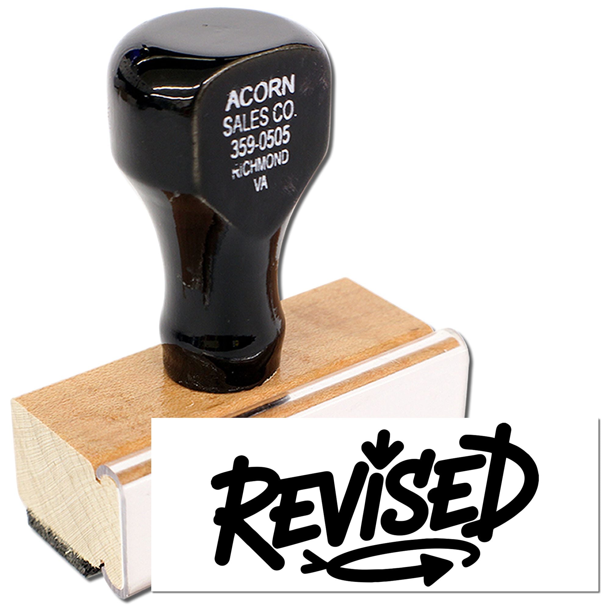 Custom rubber stamp with REVISED imprint and business address for office document marking