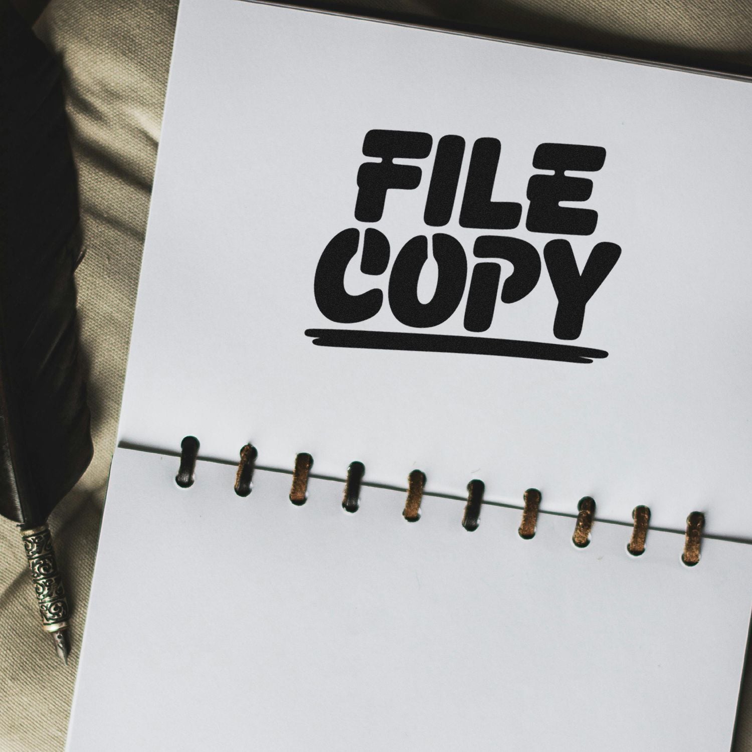 FILE COPY rubber stamp impression on paper for office filing, document control, and record organization.