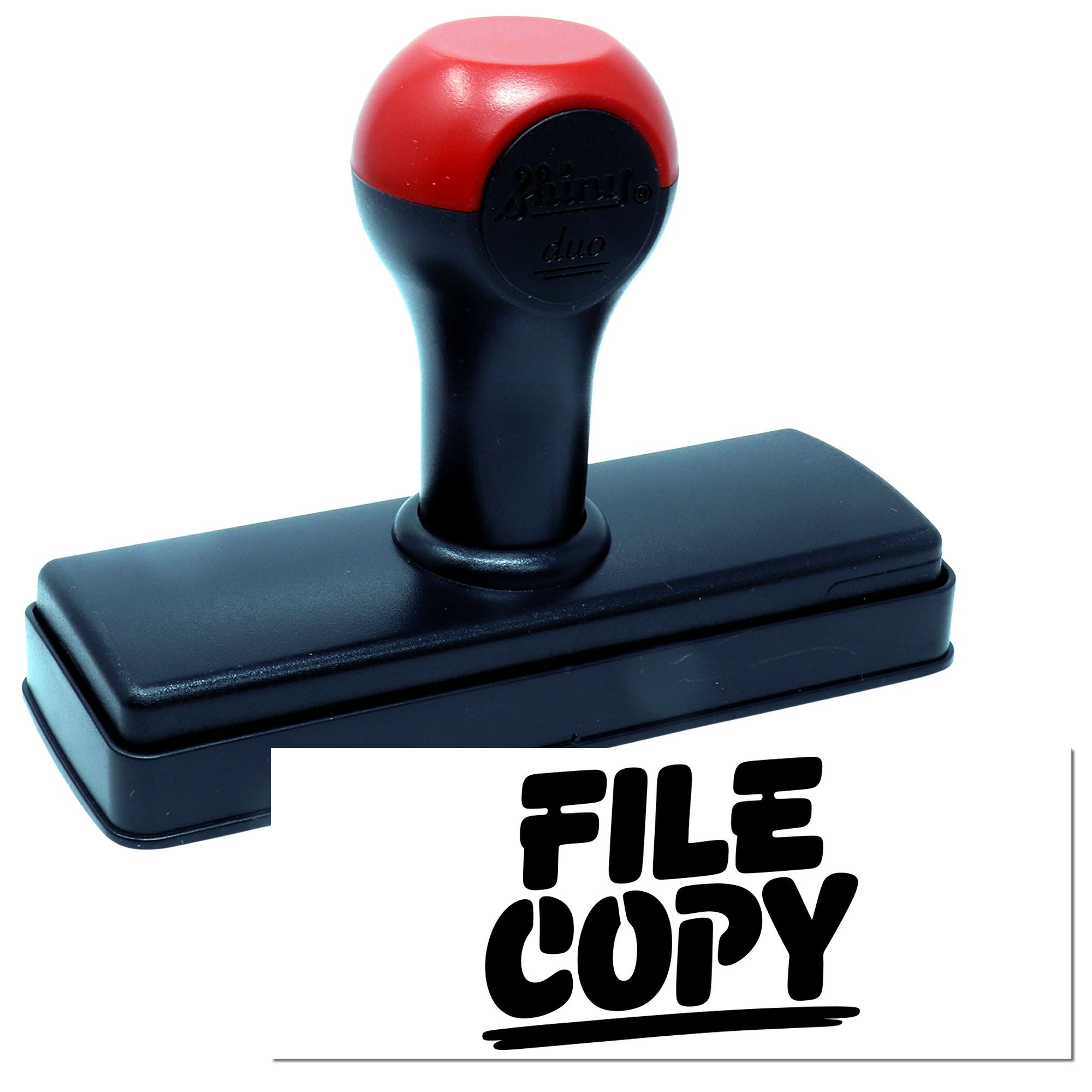 Self-inking rubber stamp showing FILE COPY imprint for office document handling and record keeping