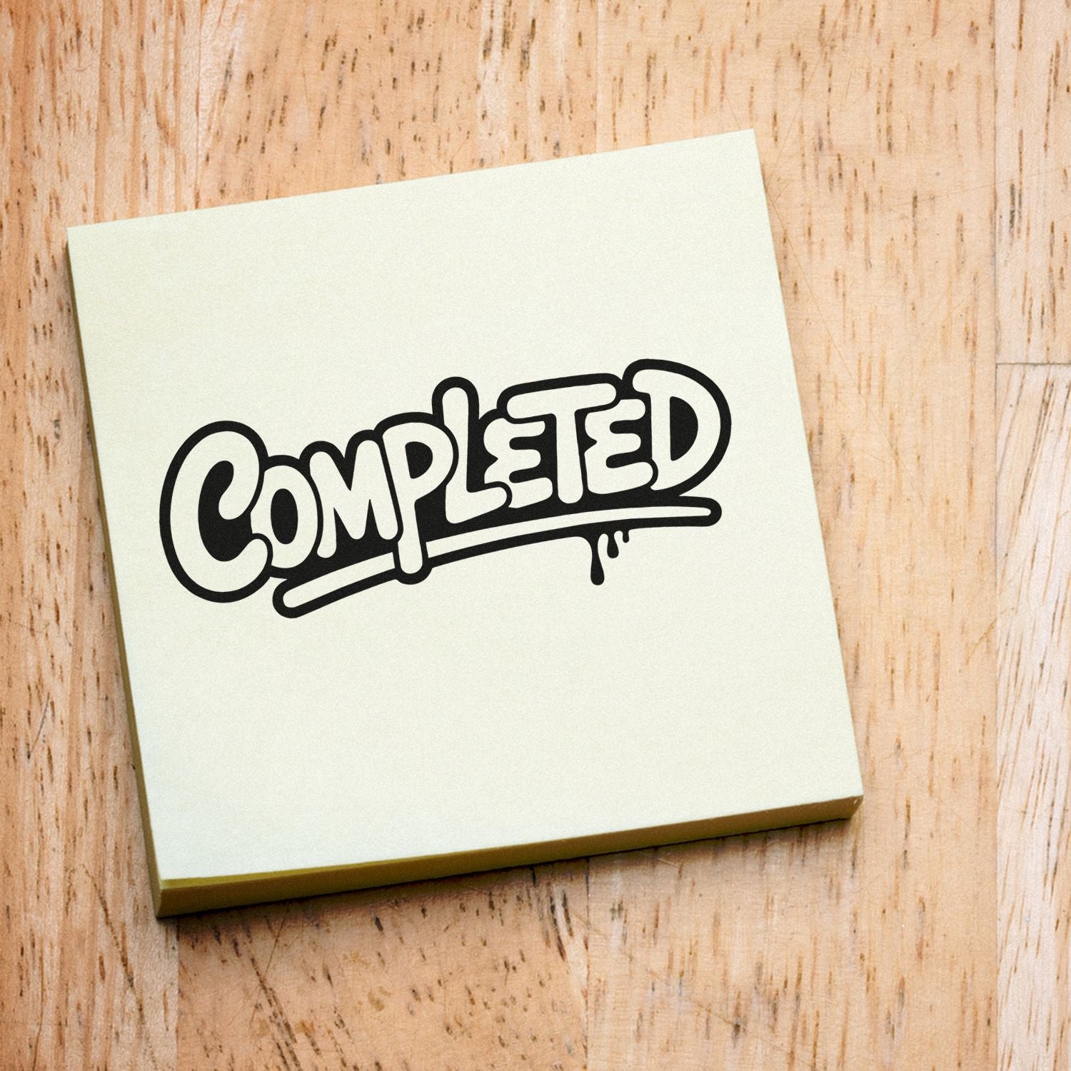 Completed rubber stamp design for office approvals, project status marking, and packaging labels on a wood background.
