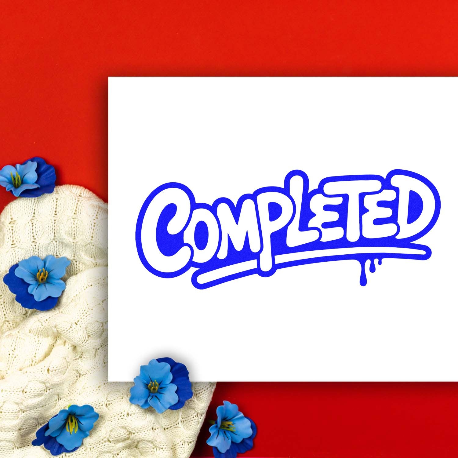 Completed rubber stamp design in bold blue bubble letters on white card for office, planner, and craft organization.