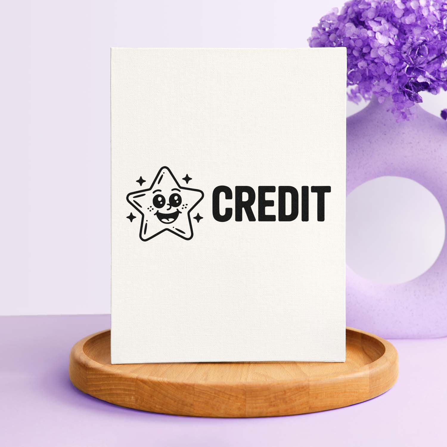 Cute smiling star CREDIT rubber stamp design on canvas, ideal for planner, craft, and custom stationery branding.