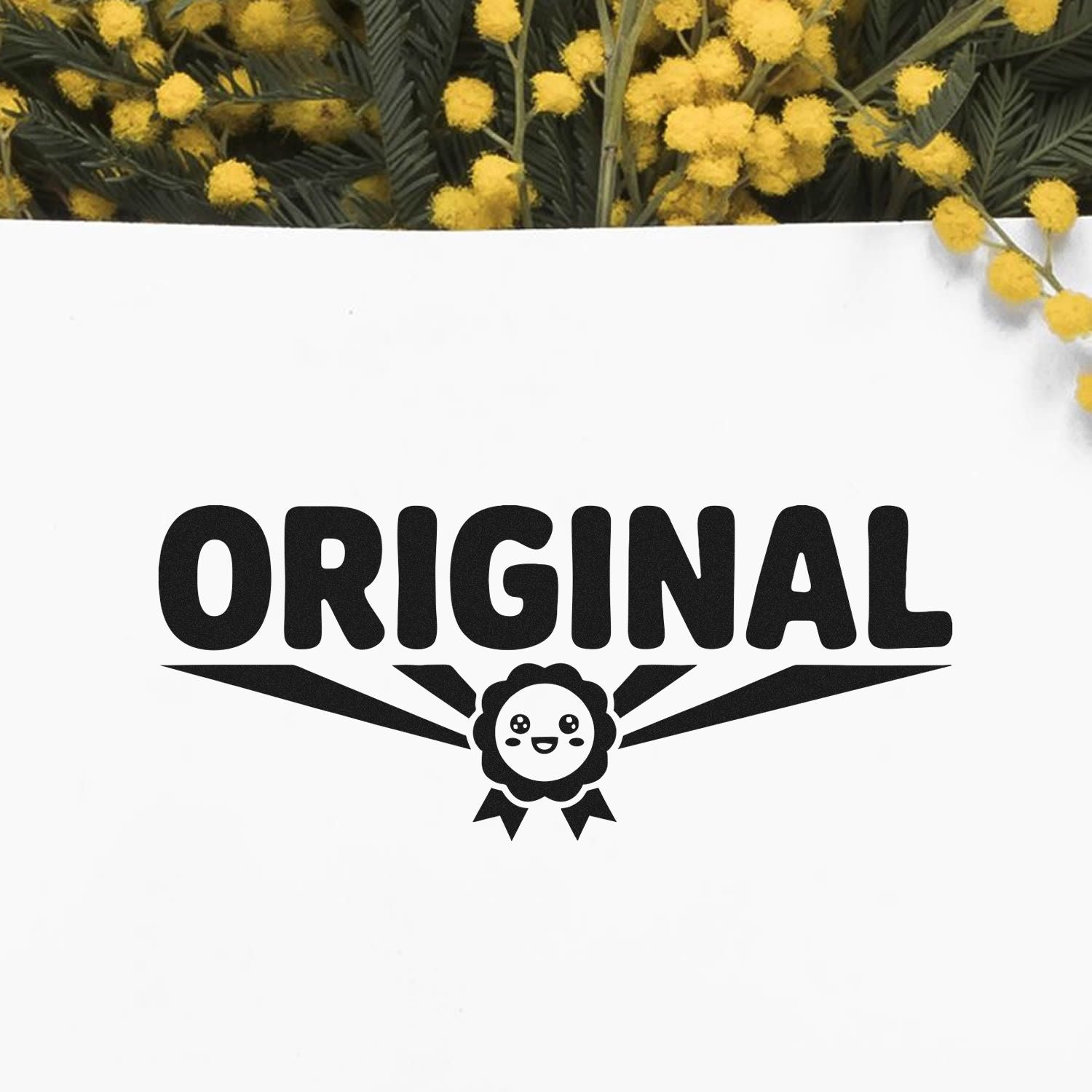 Original rubber stamp design with cute mascot logo and bold lettering on a floral mockup.
