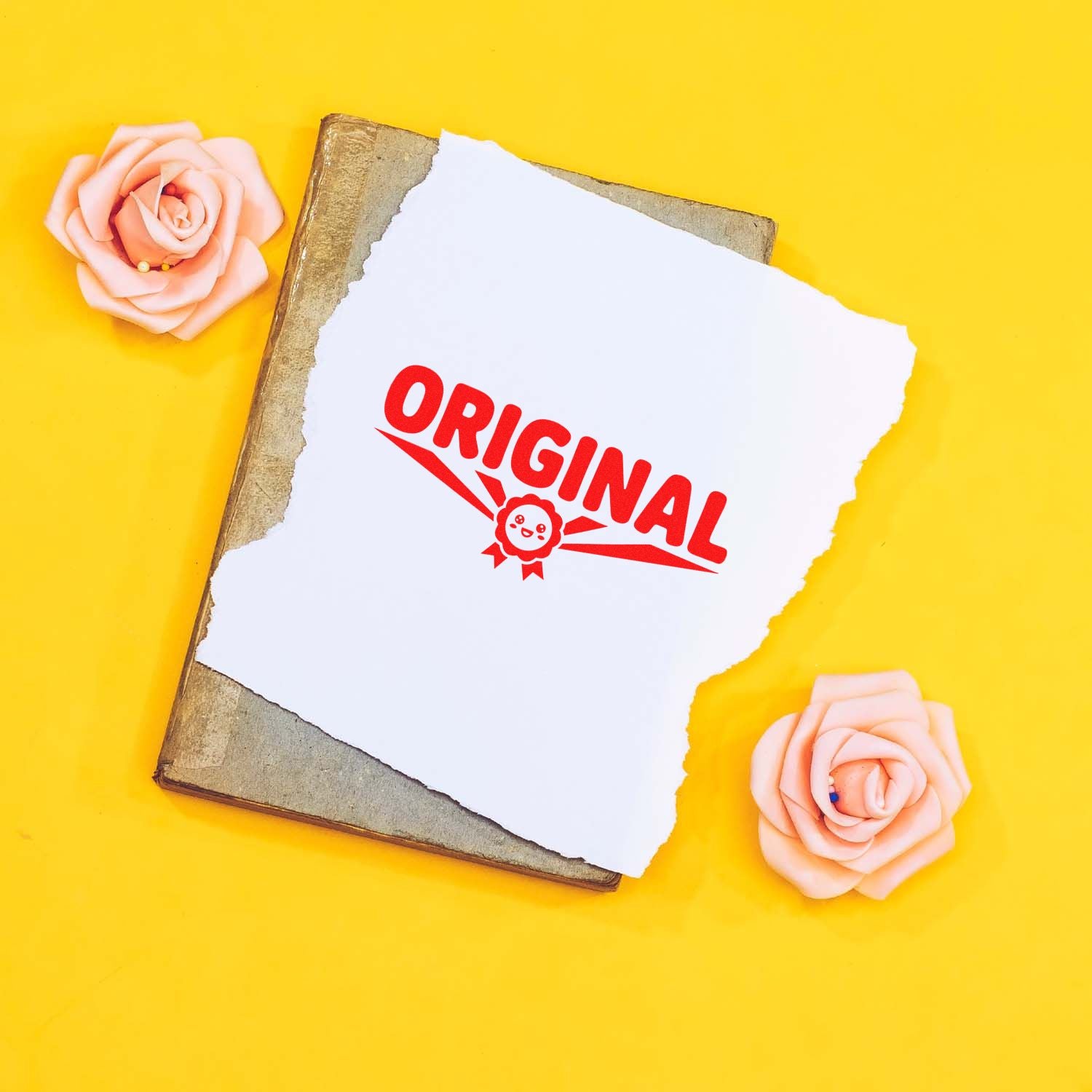 Original rubber stamp design on torn paper, perfect for handmade branding, packaging, and craft projects.