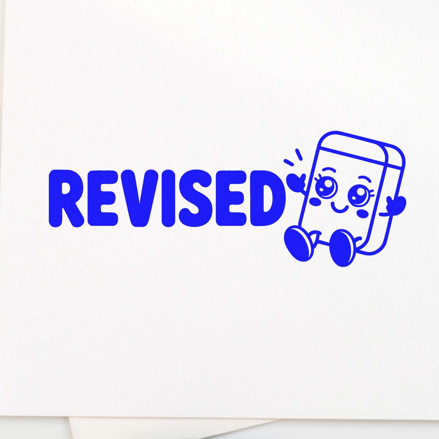 Blue REVISED rubber stamp imprint for document review, corrections, and approval.