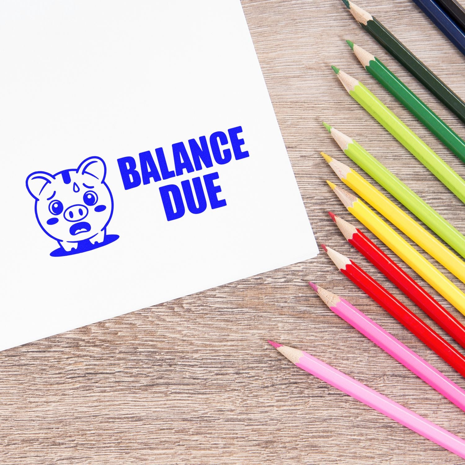 Balance Due rubber stamp on invoice paper for marking unpaid bills and overdue accounts.
