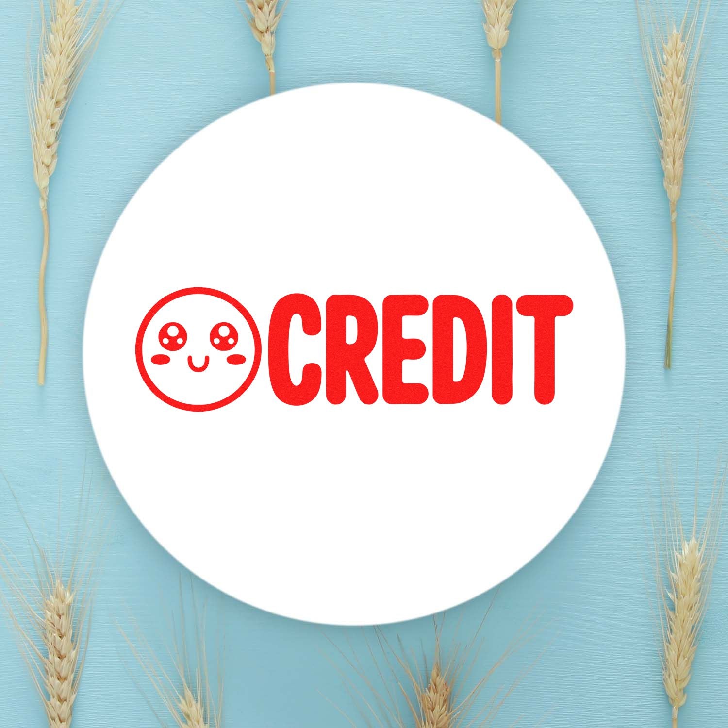 Cute credit rubber stamp design with red lettering, ideal for bakery packaging and branding.