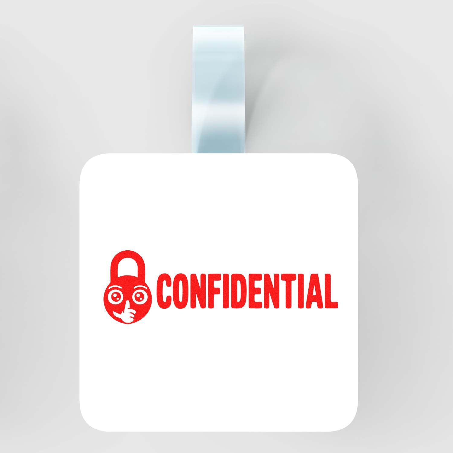 Confidential rubber stamp with lock icon for secure document marking and office privacy labeling.