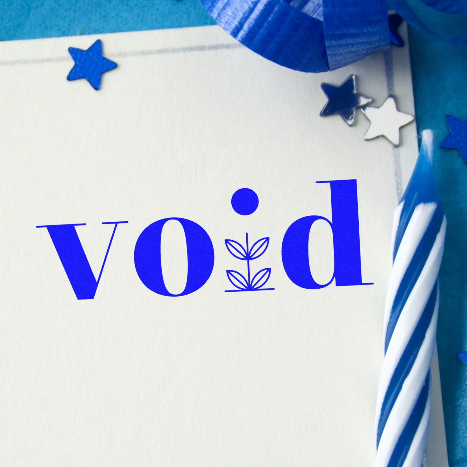 Blue custom rubber stamp design spelling void with star accents for branded stationery, packaging, and craft projects.
